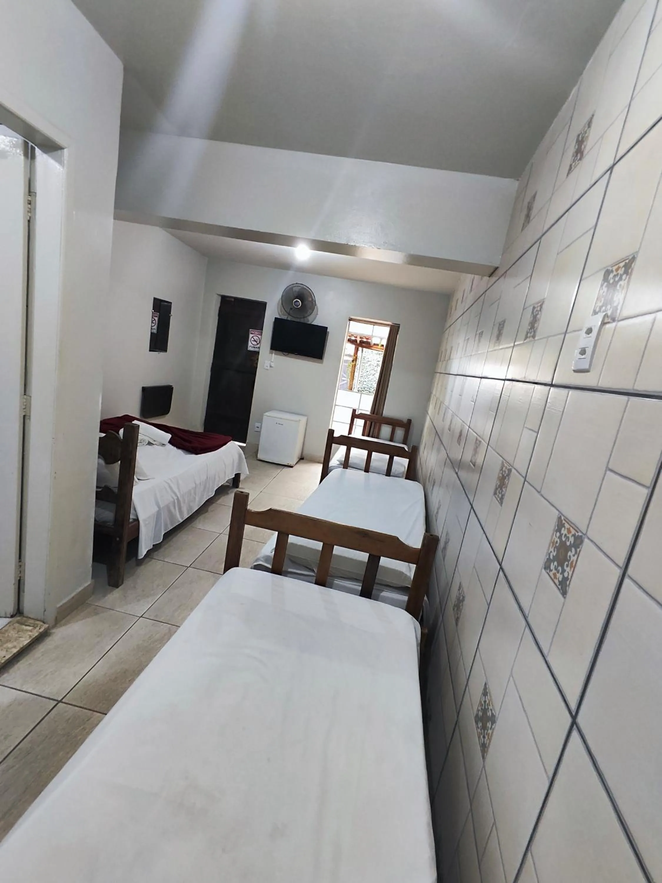 Bed in Pousada Acayaca