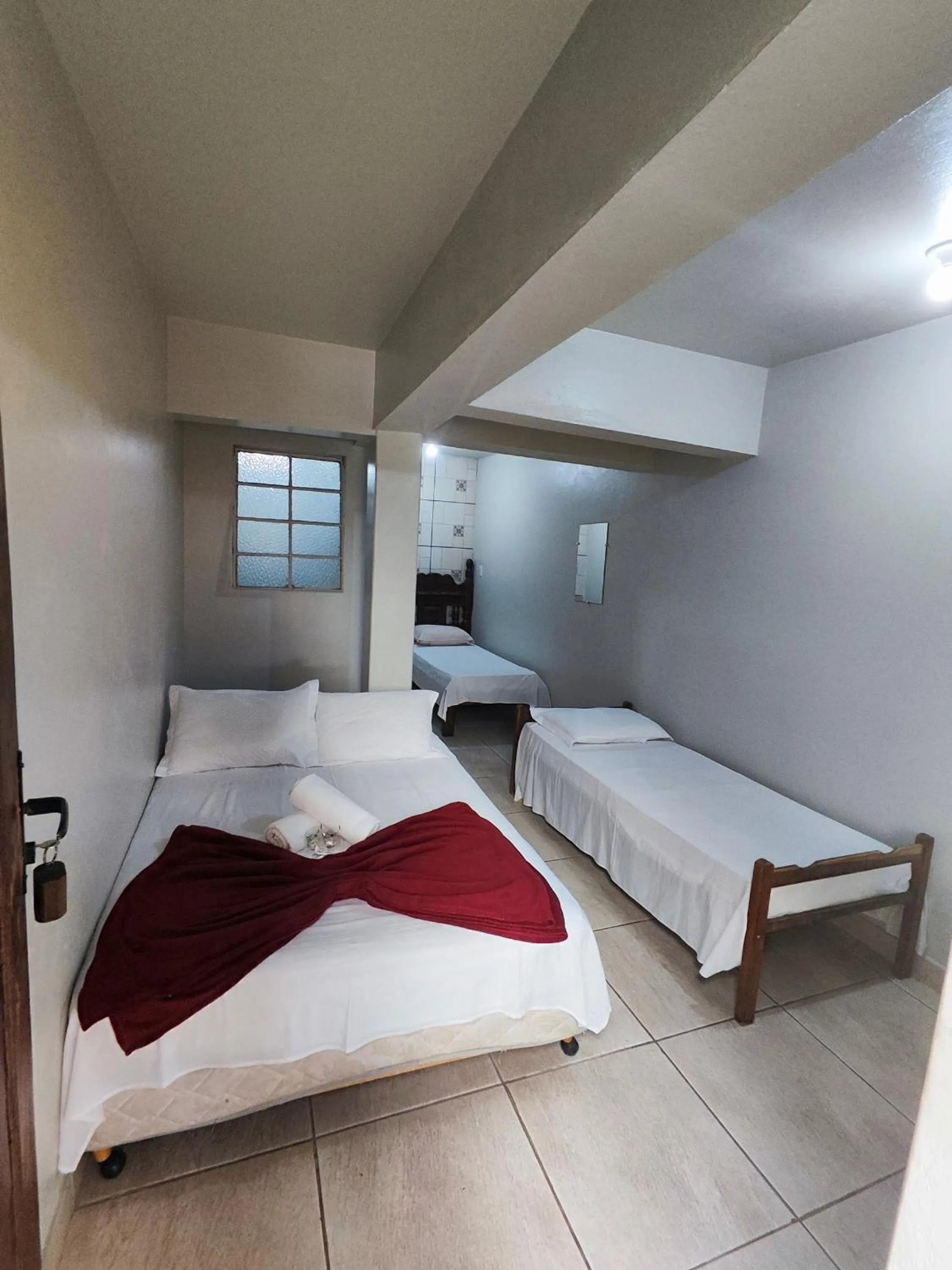 Bed in Pousada Acayaca