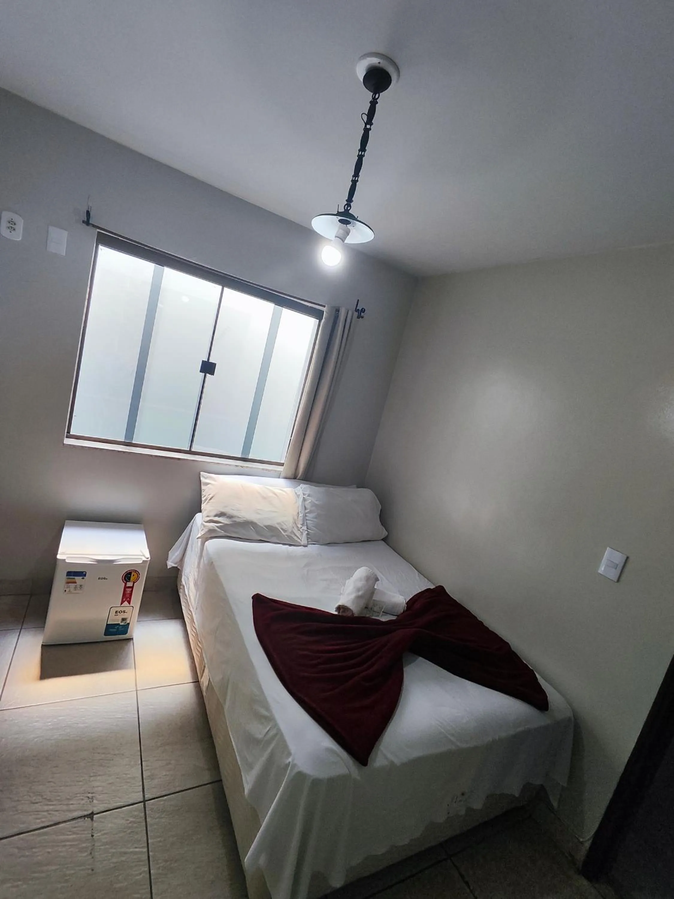 Bed in Pousada Acayaca