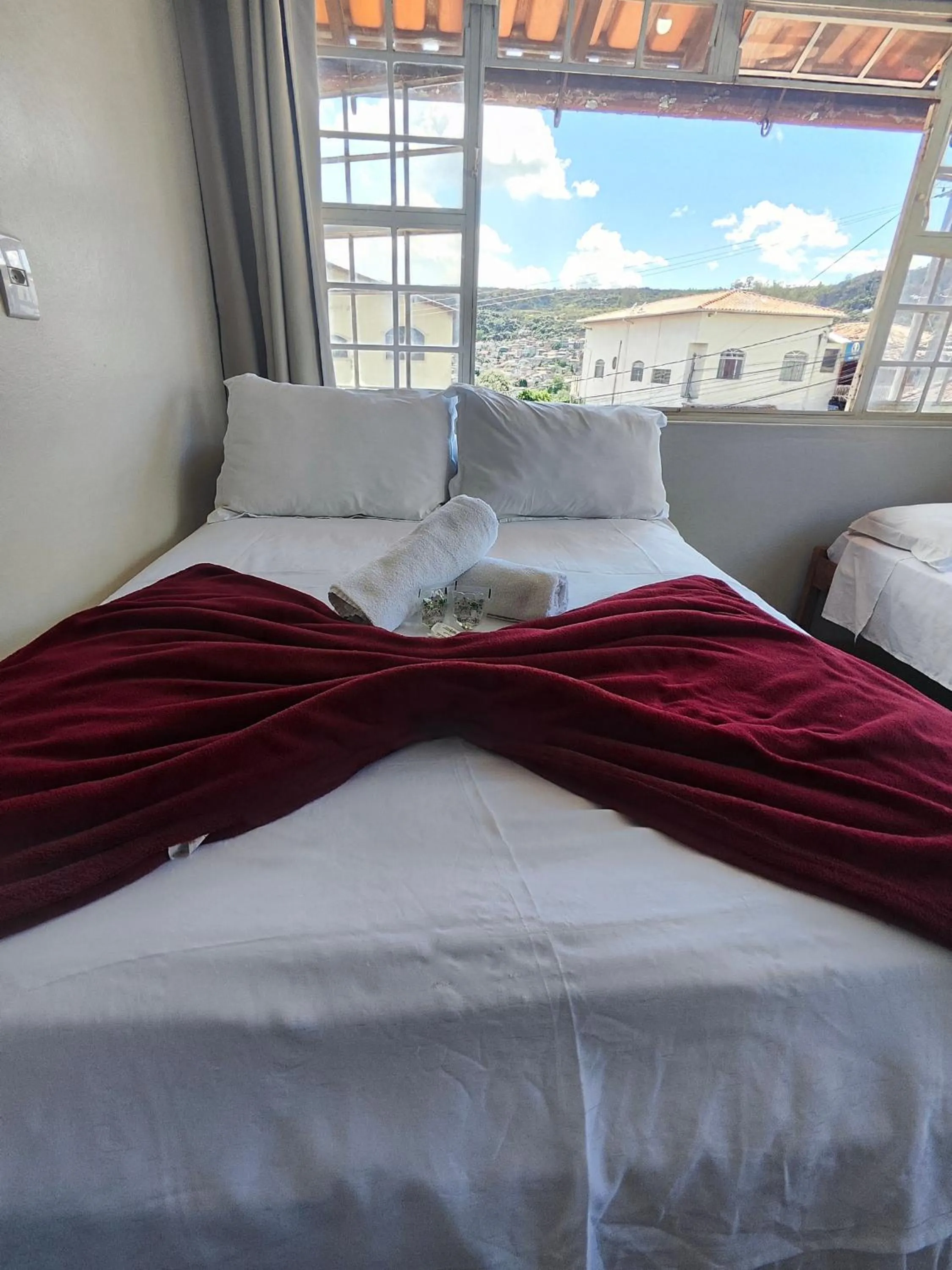 Bed in Pousada Acayaca