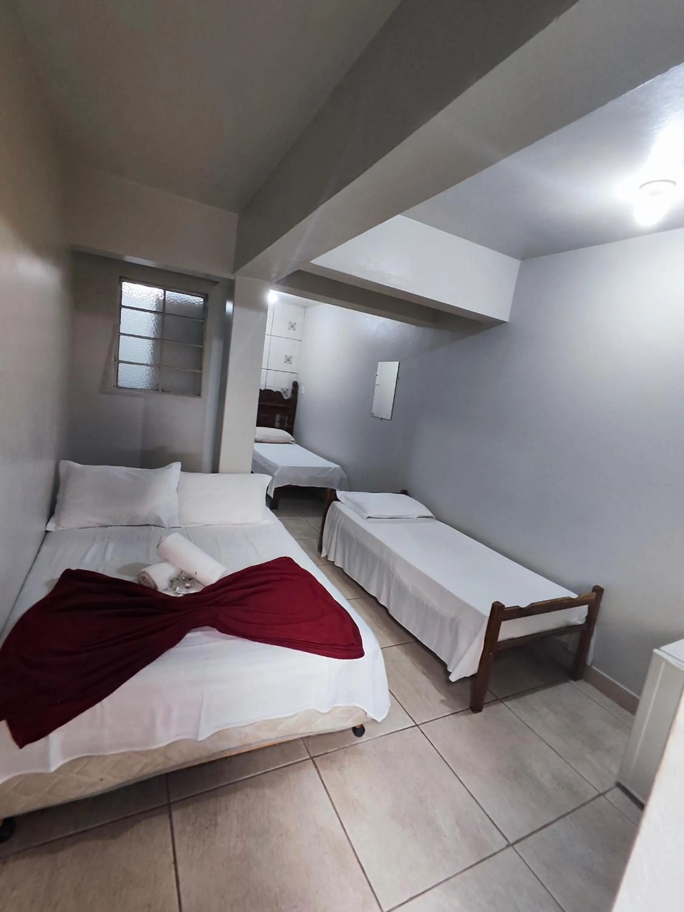 Bed in Pousada Acayaca