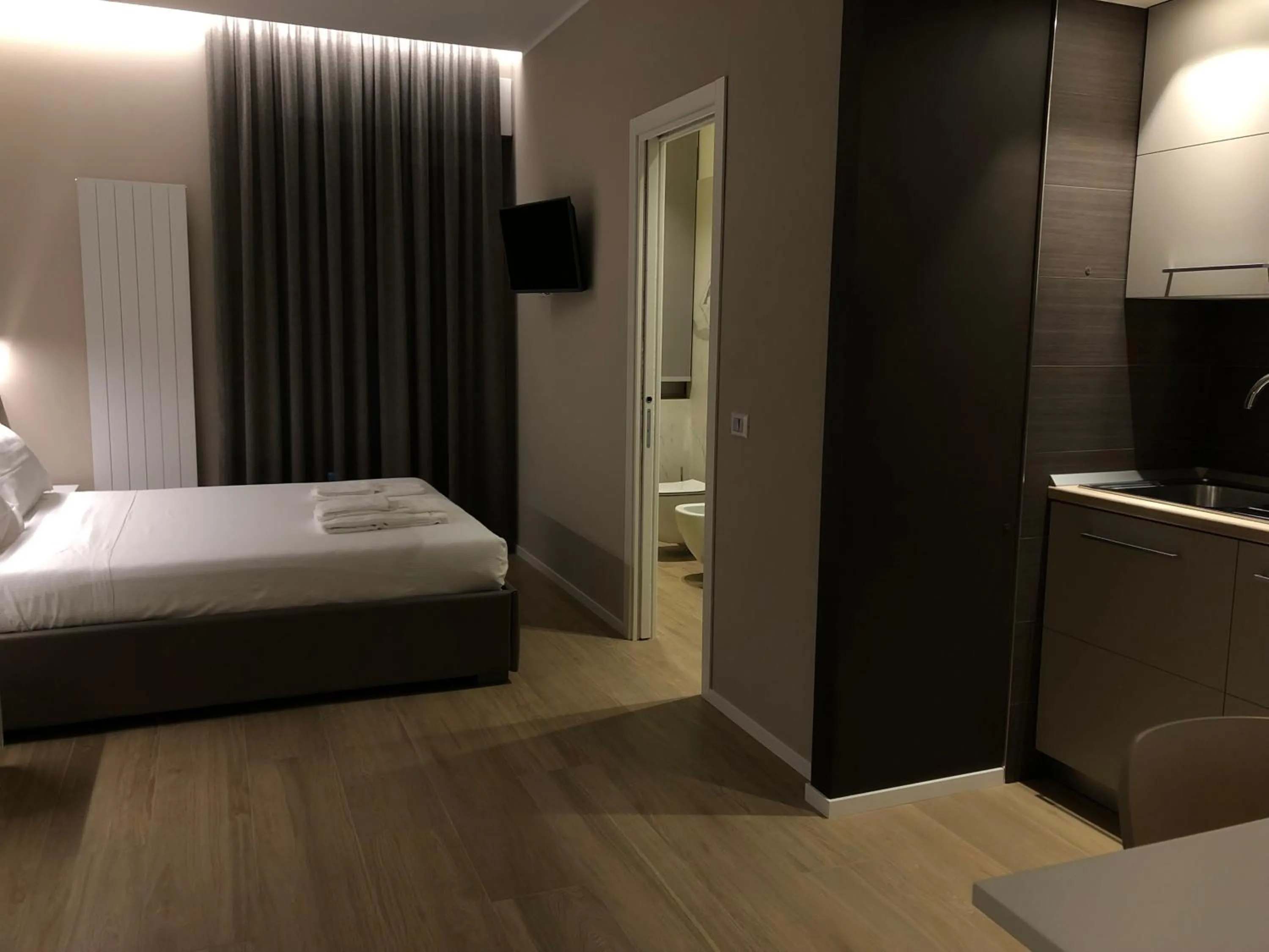 Bed in APPRODO RESiDENCE