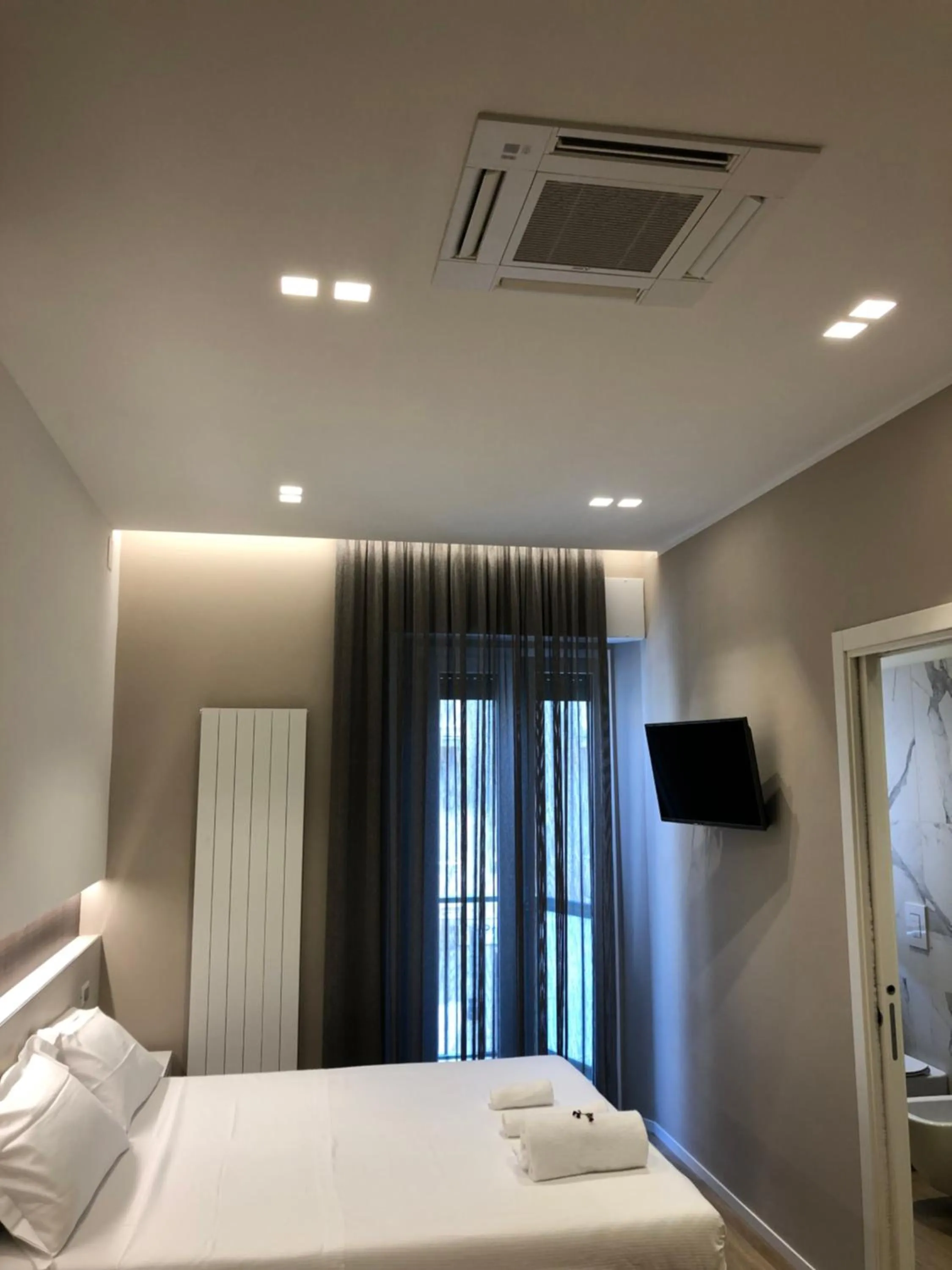 Bed in APPRODO RESiDENCE