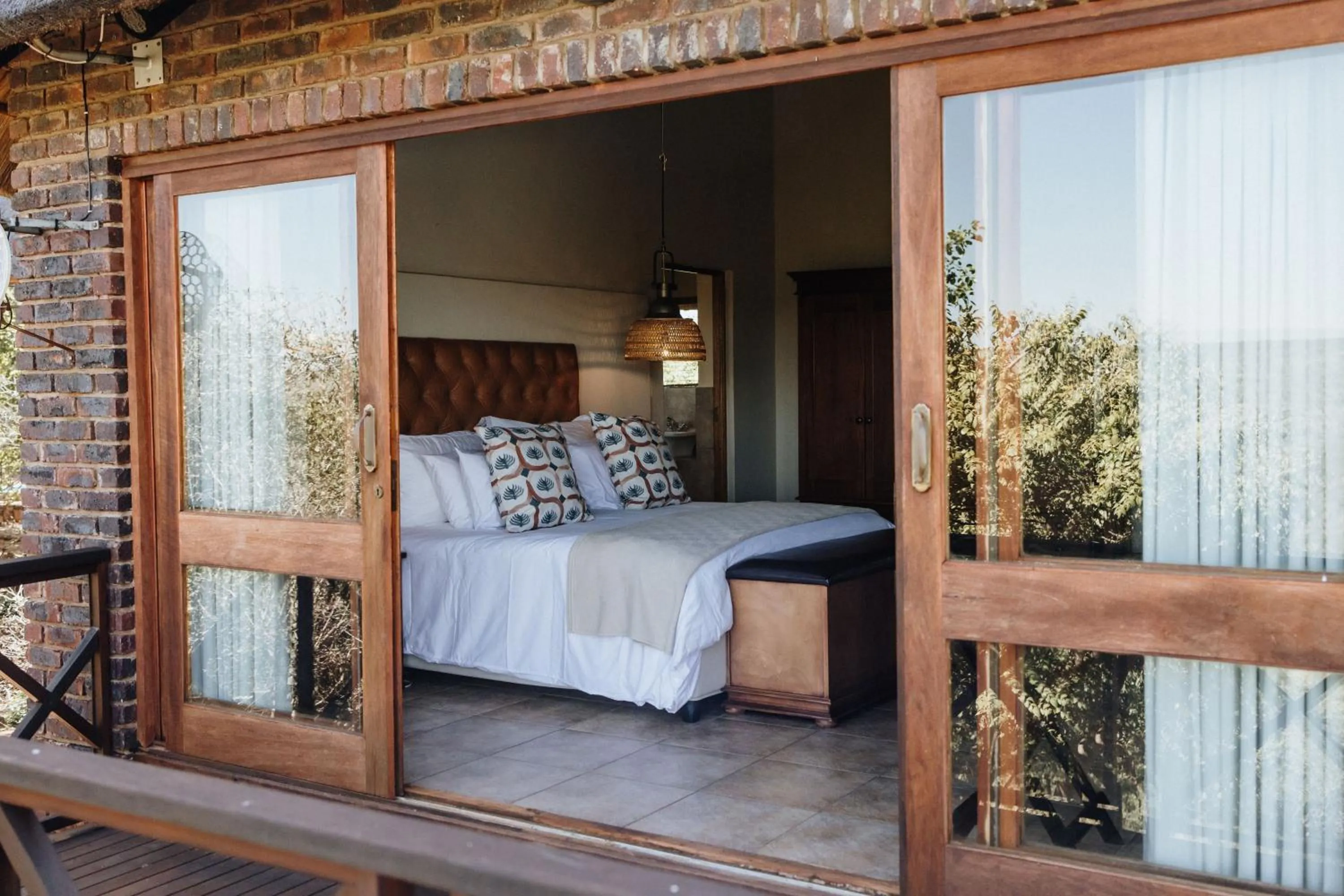 View (from property/room), Bed in Dinkweng Safari Lodge