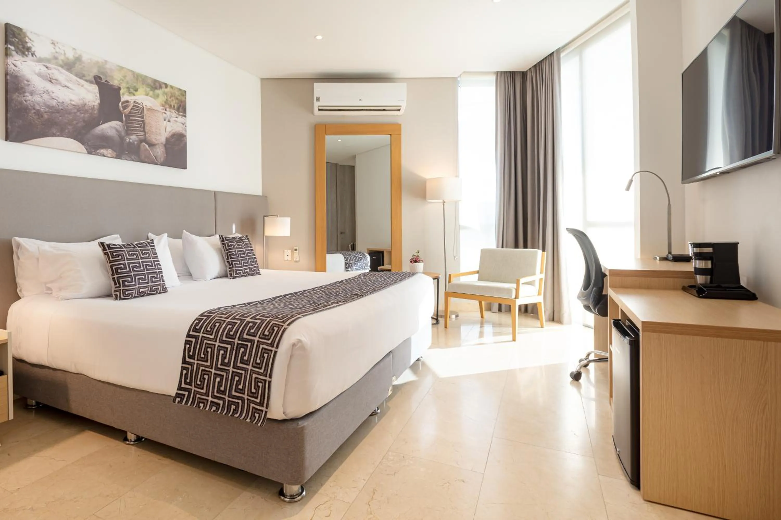 Bed in Grand Marina Suites Santa Marta