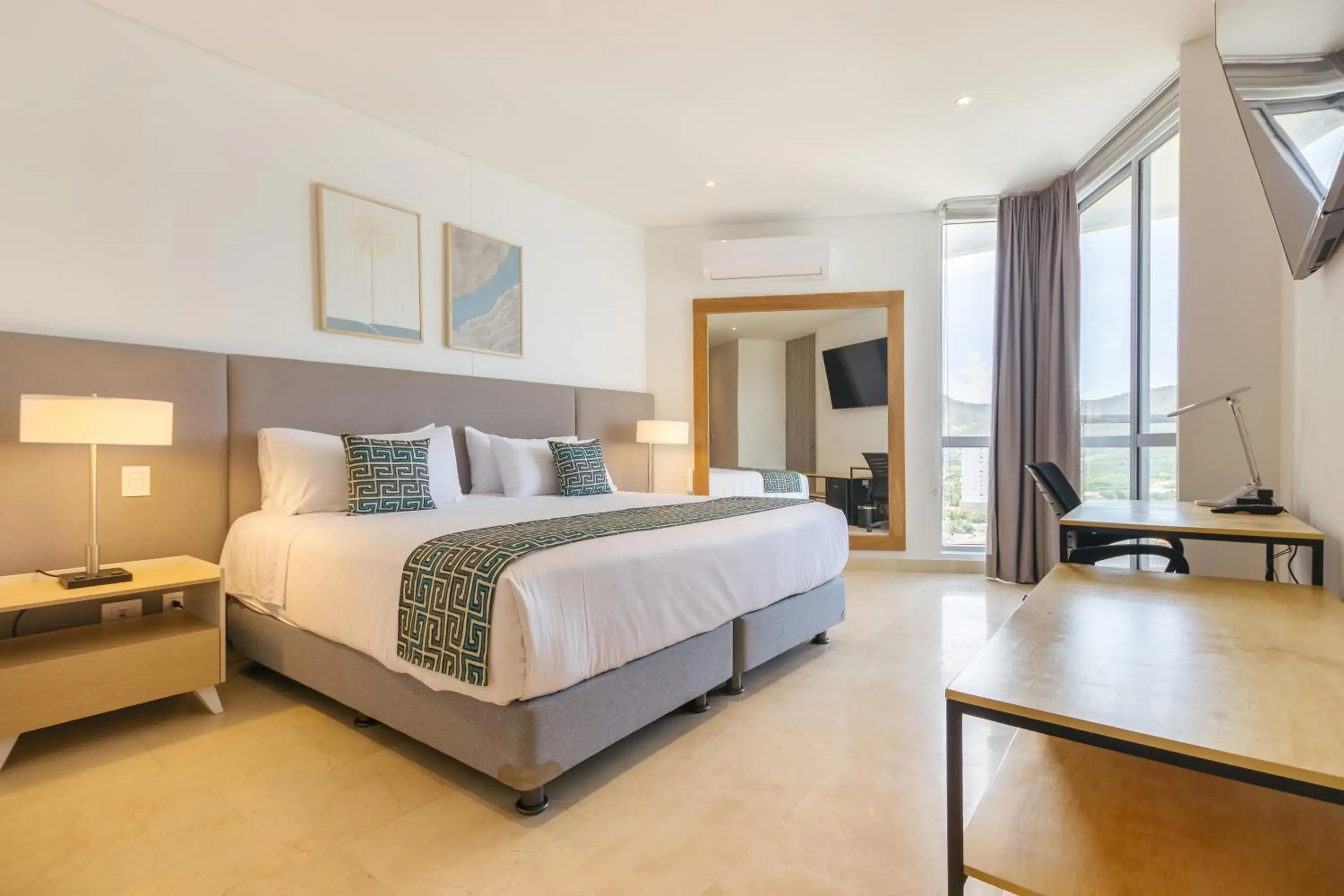 Bed in Grand Marina Suites Santa Marta Bed in Grand Marina Suites Santa Marta