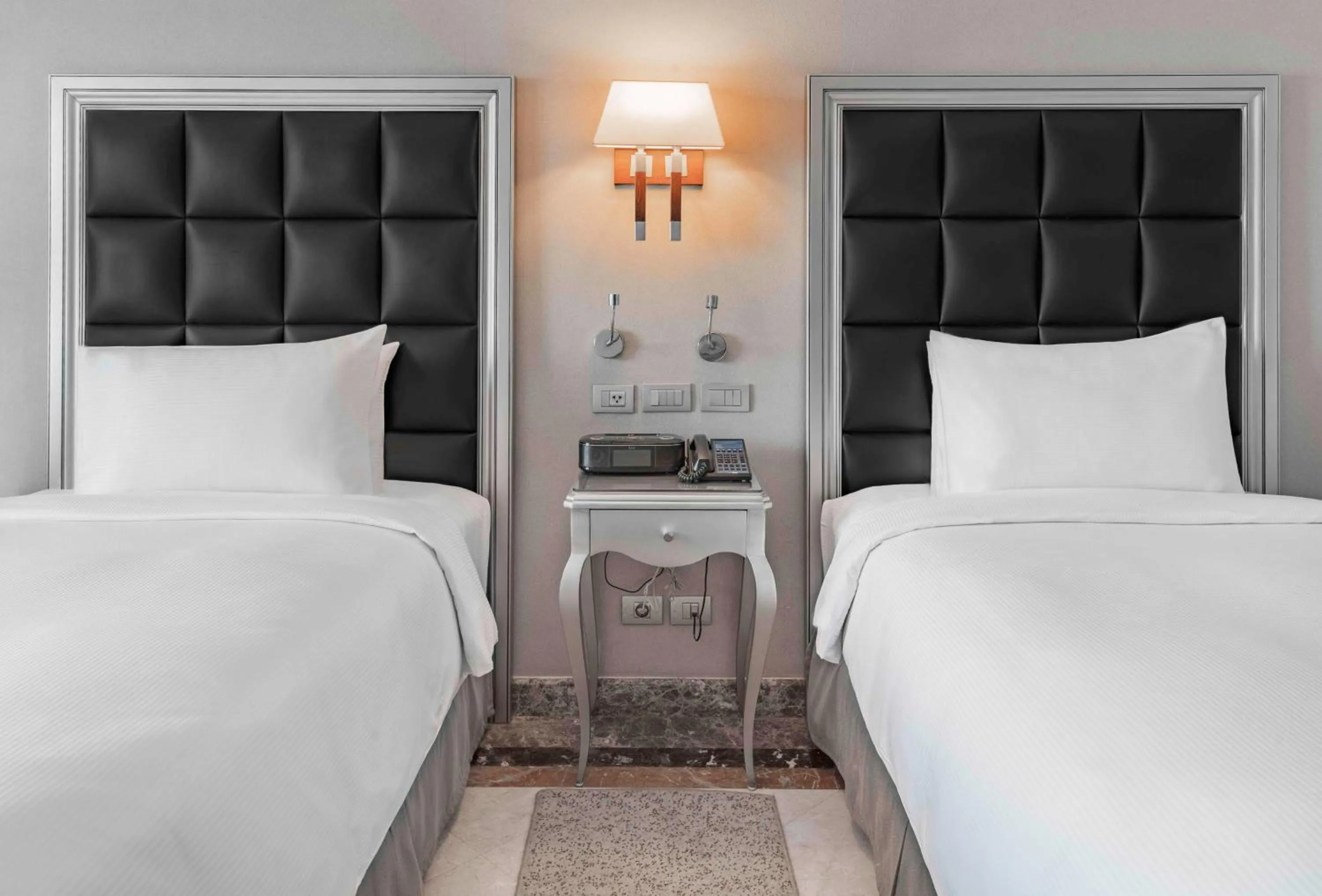 Bed in Hilton Alexandria Corniche Hotel