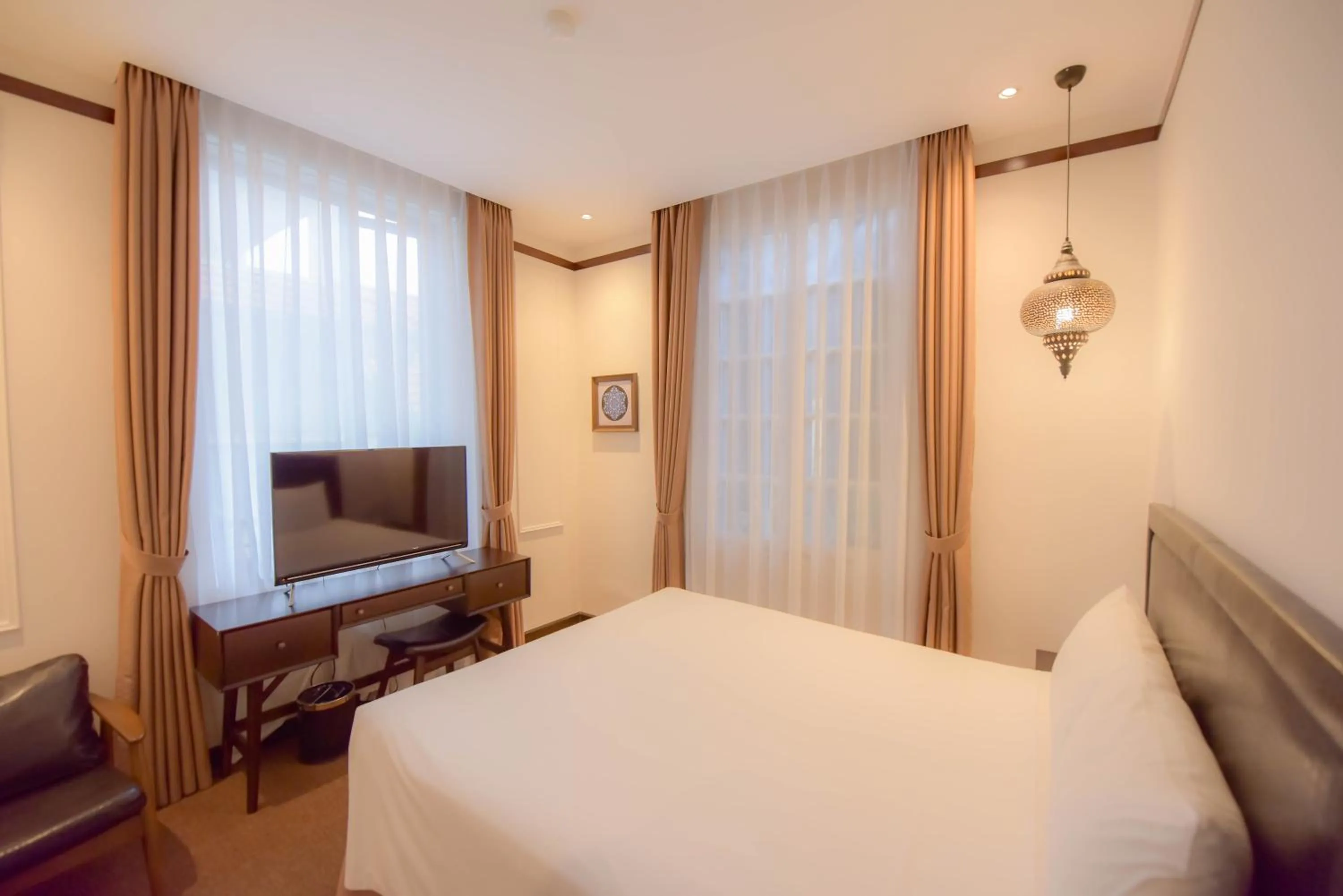 Living room, Bed in Rosa Hanoi Hotel