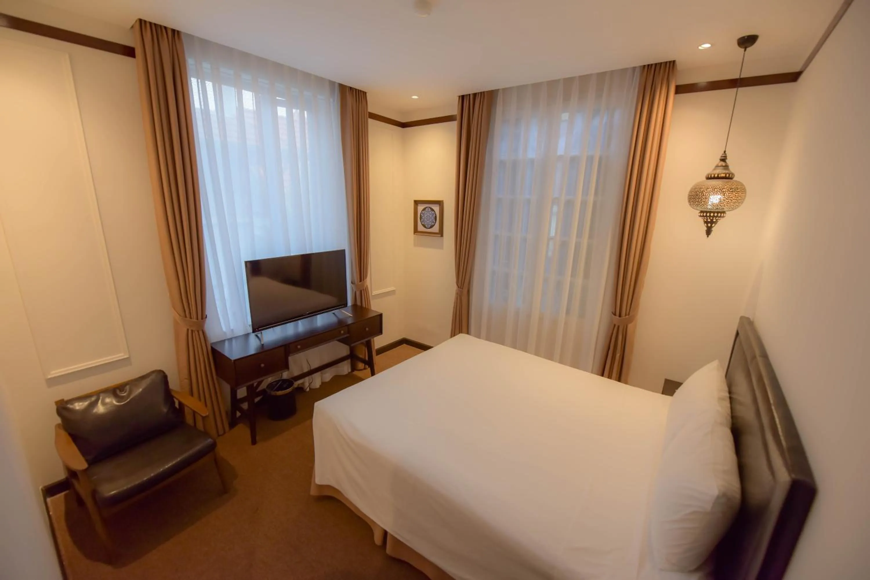 Living room, Bed in Rosa Hanoi Hotel