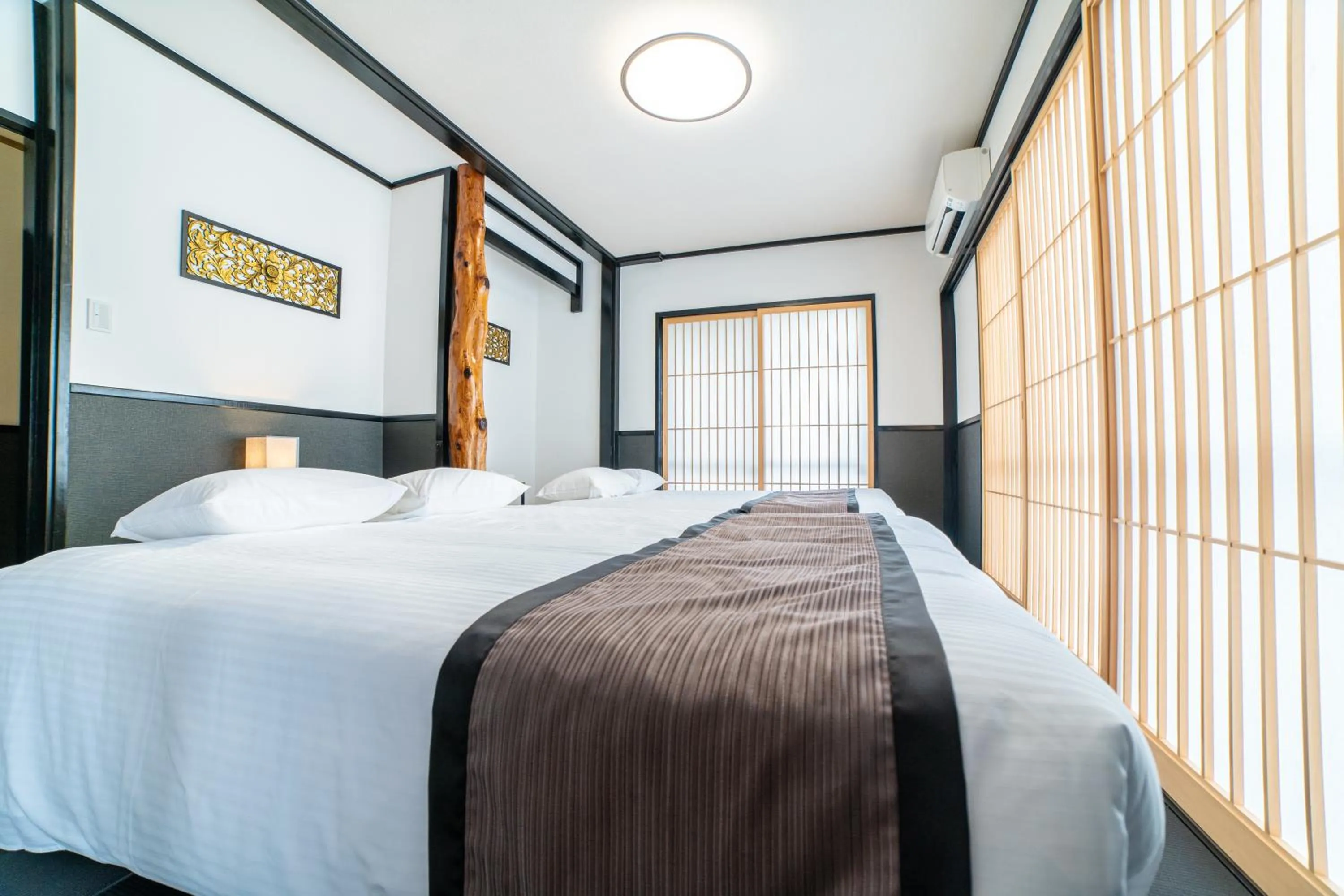 Bed in Crystal Villa Imgya