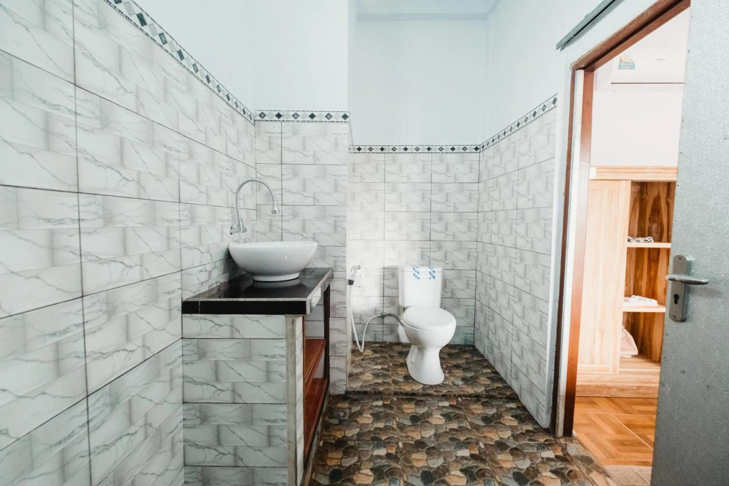 Bathroom in Rizky Guesthouse