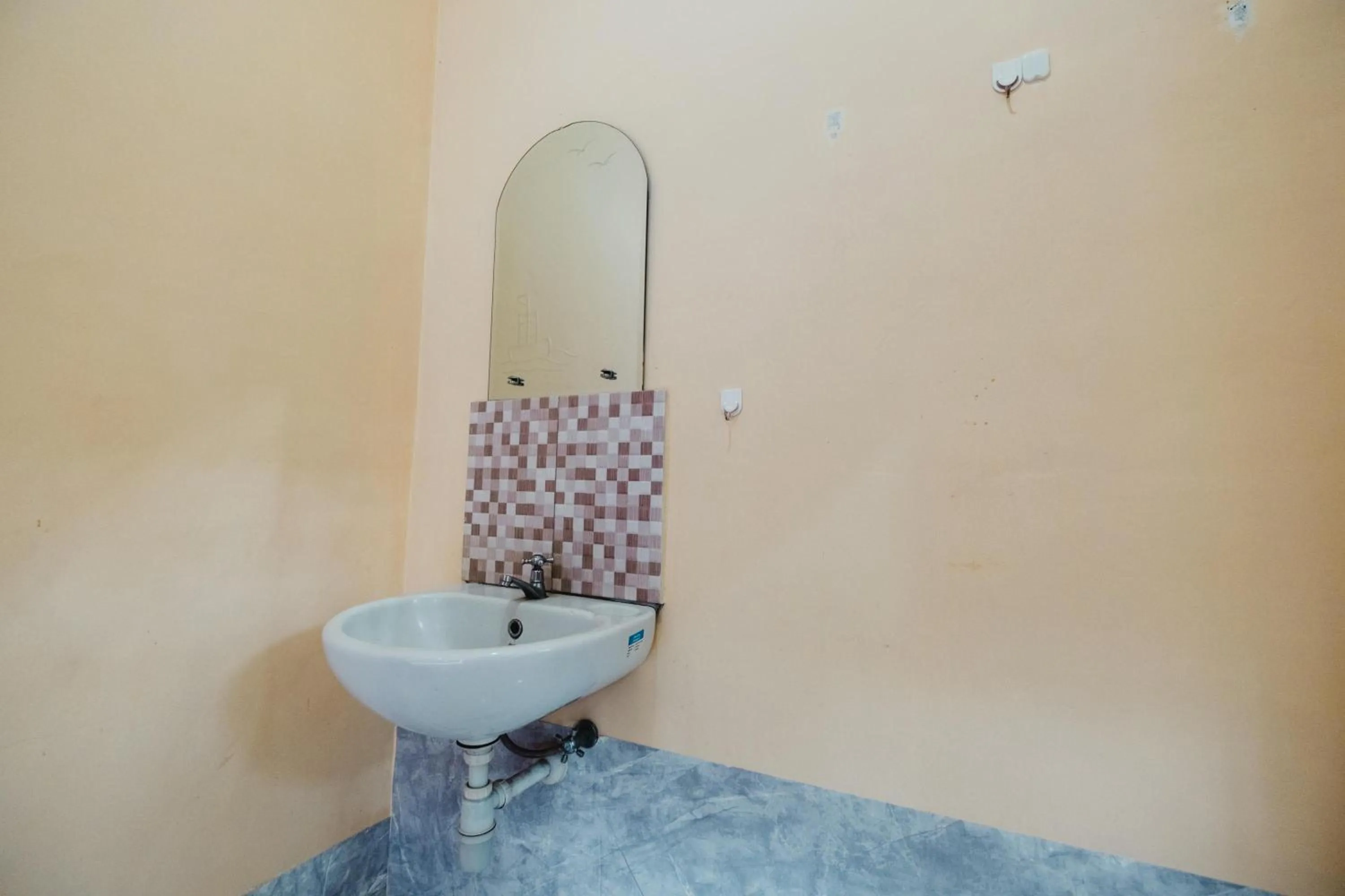 Bathroom in Rizky Guesthouse