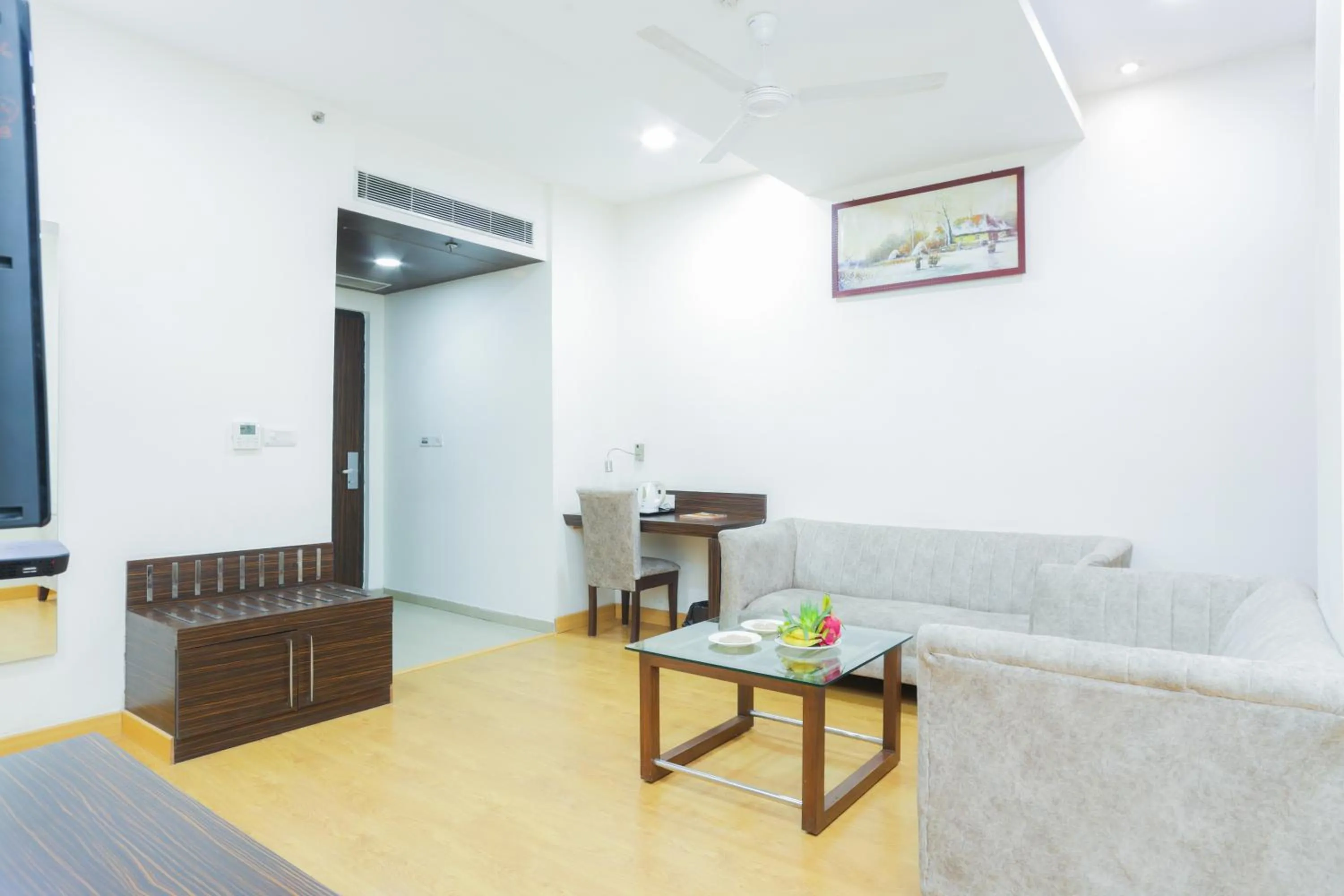 Living room in Hyphen Premier-Business Hotel