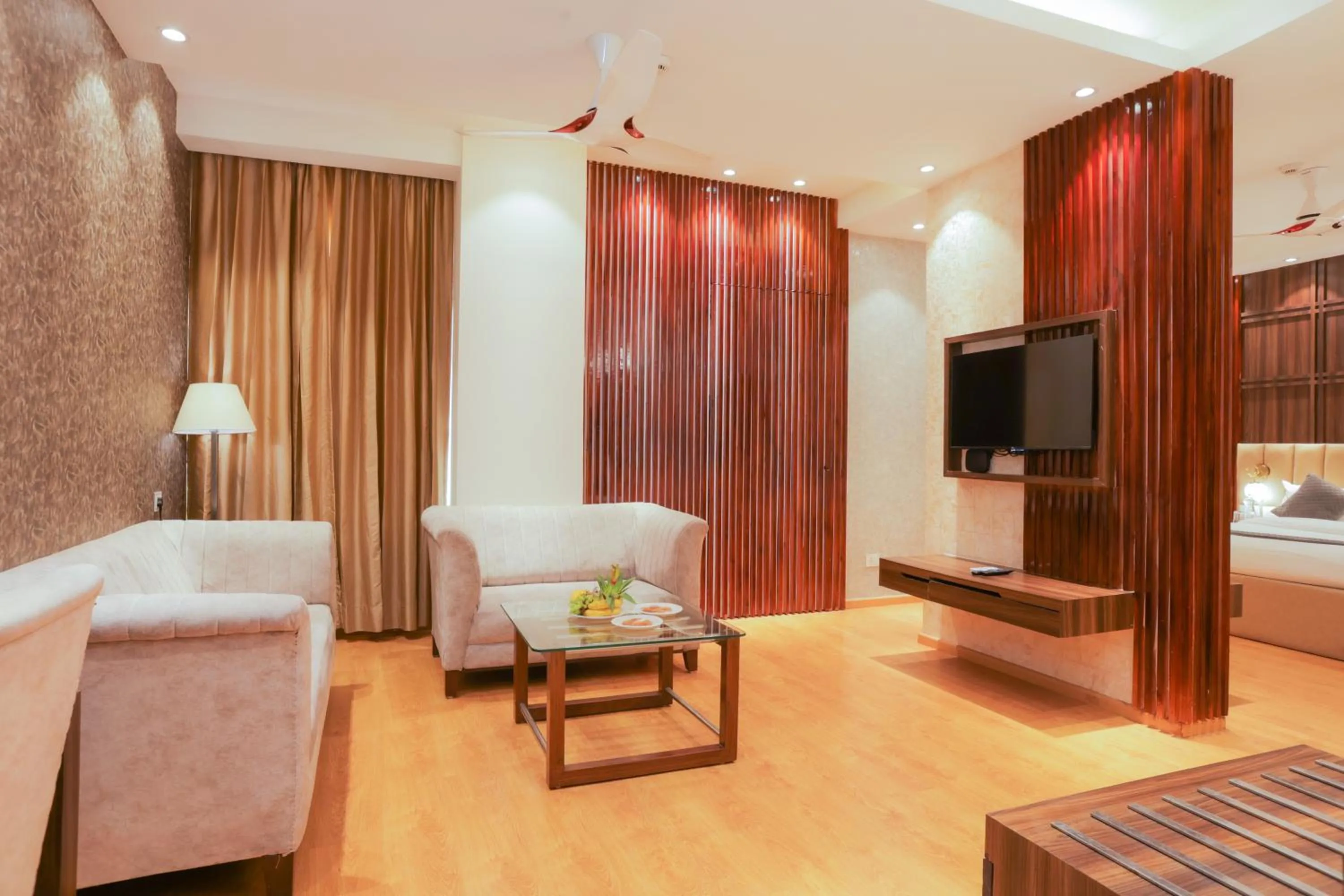 Living room, Bed in Hyphen Premier-Business Hotel