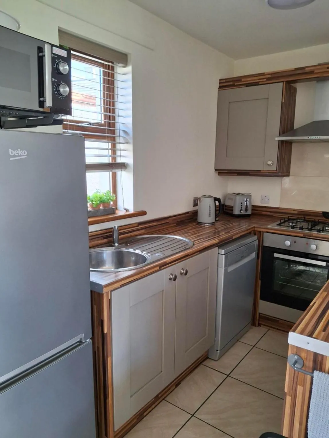 Kitchen or kitchenette in Ulster Cottages 4 miles From Portrush Bushmills Coleraine and Ballymoney