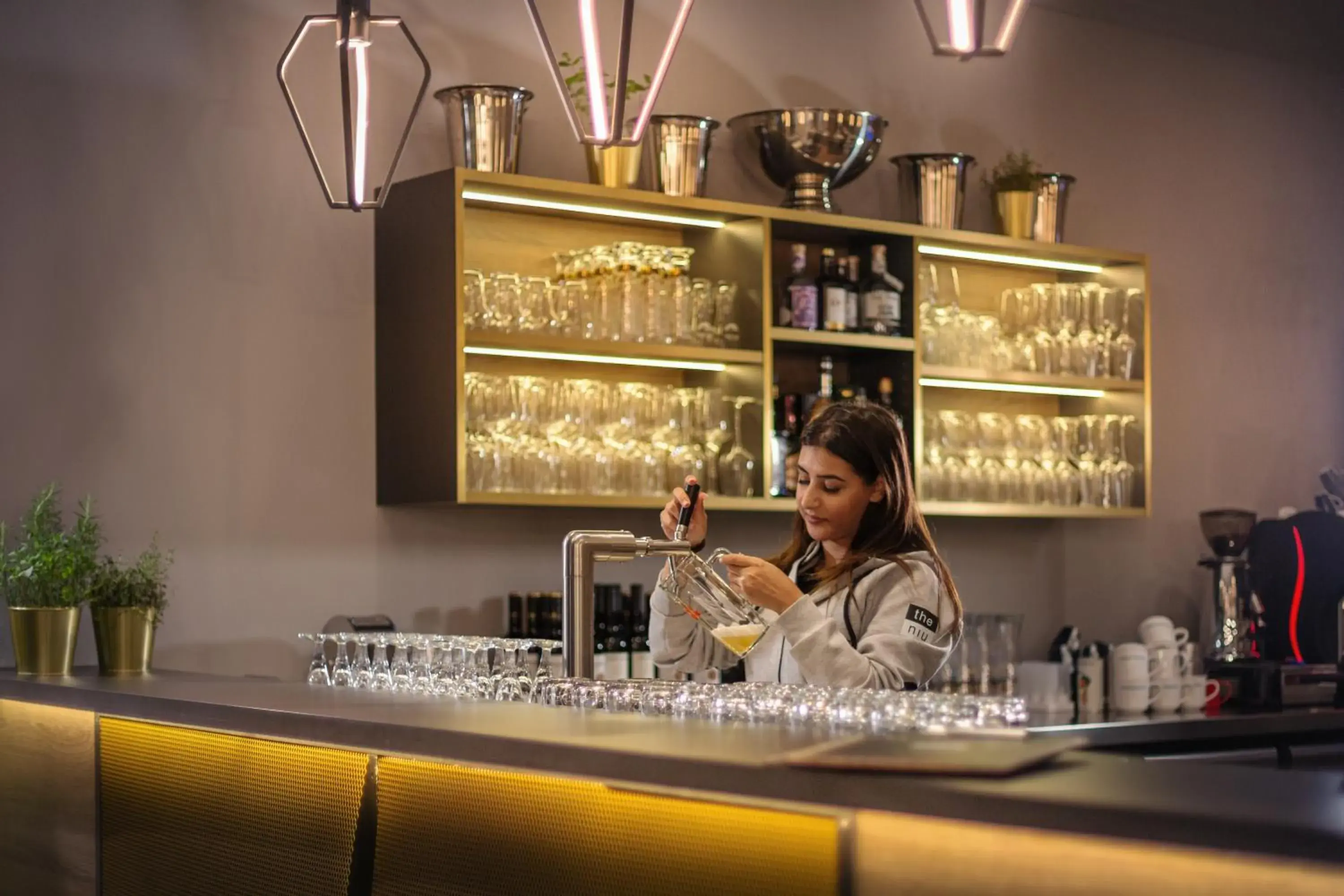 Lounge or bar in Holiday Inn - the niu, Mesh Stuttgart Messe by IHG Lounge or bar in Holiday Inn - the niu, Mesh Stuttgart Messe by IHG