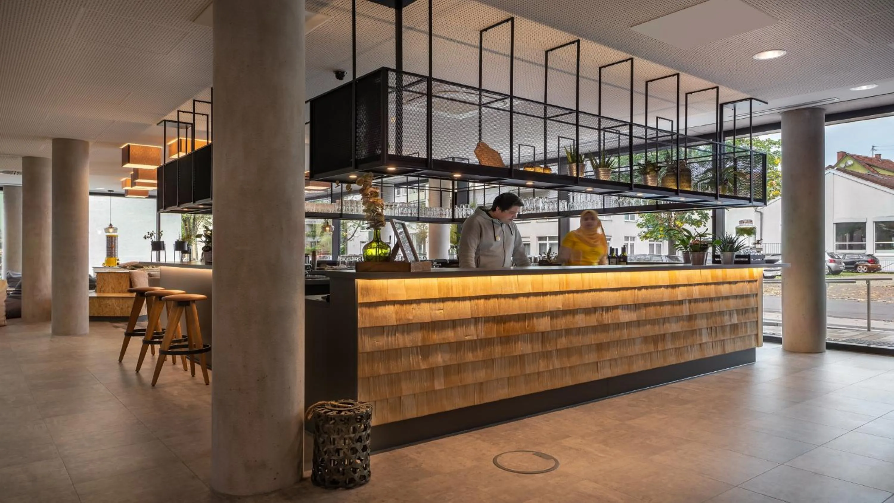 Lounge or bar in Holiday Inn - the niu, Timber Esslingen by IHG