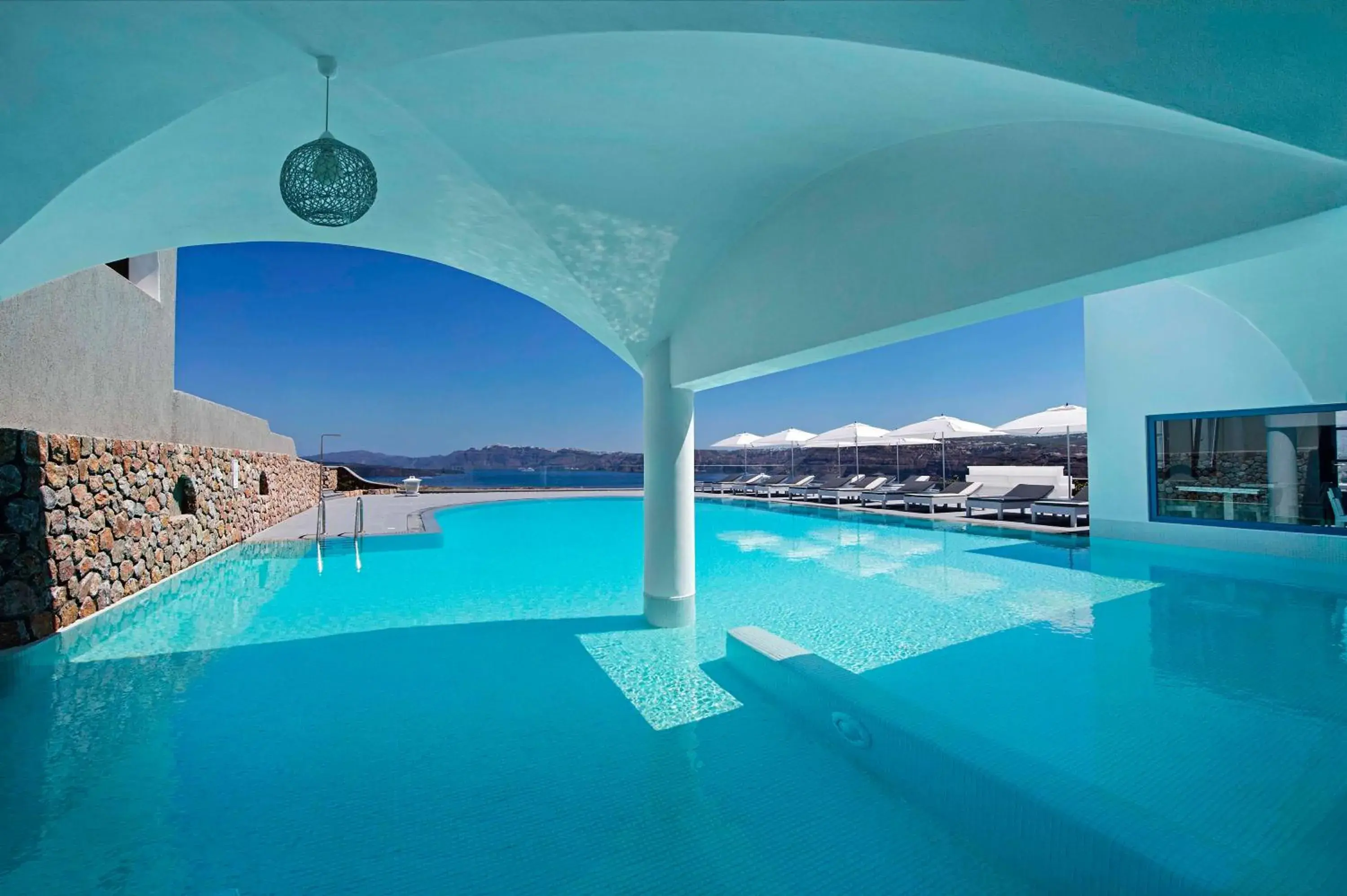 Swimming pool in Acroterra Rosa Luxury Suites & Spa Swimming pool in Acroterra Rosa Luxury Suites & Spa