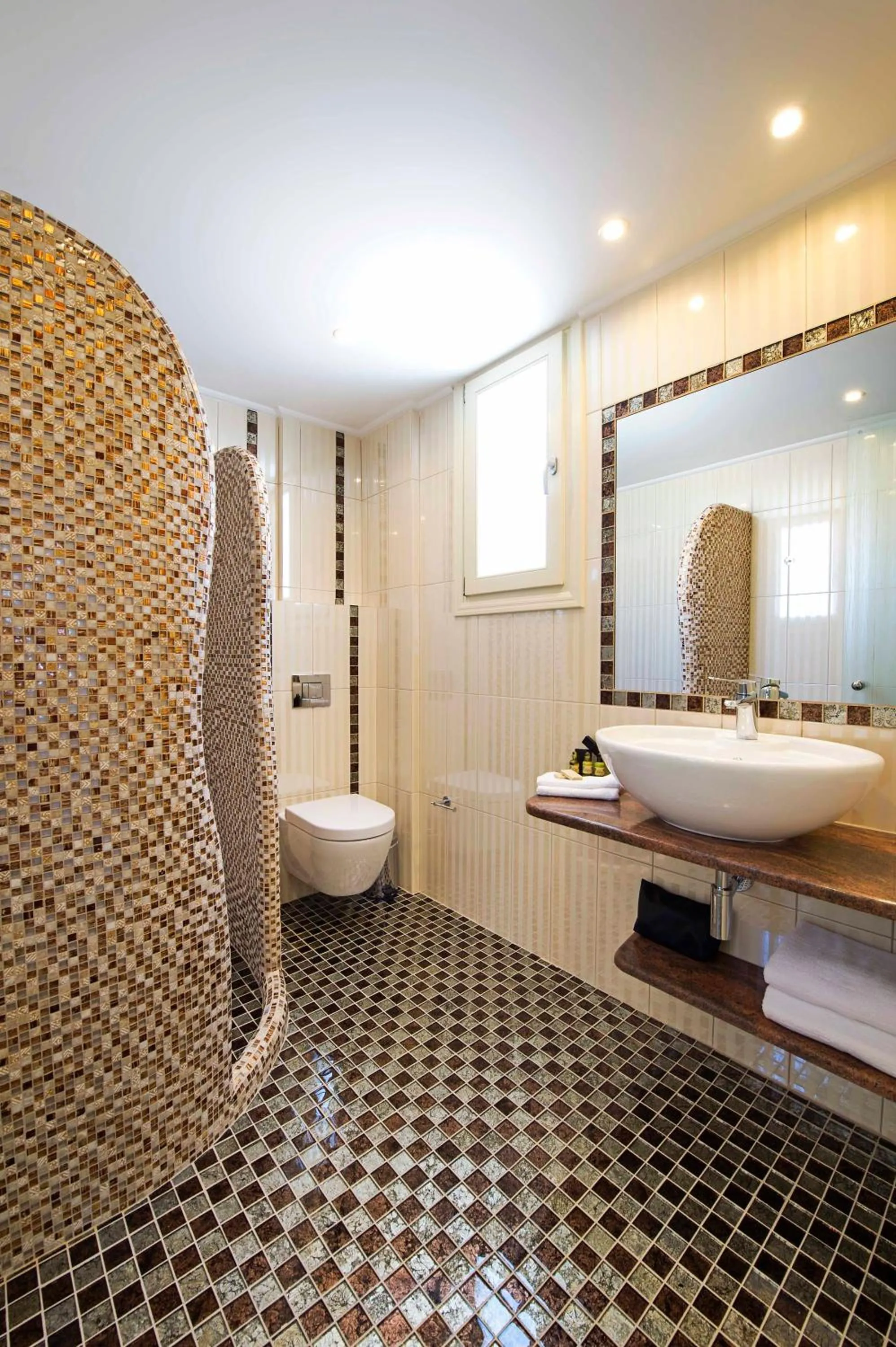 Bathroom in Acroterra Rosa Luxury Suites & Spa