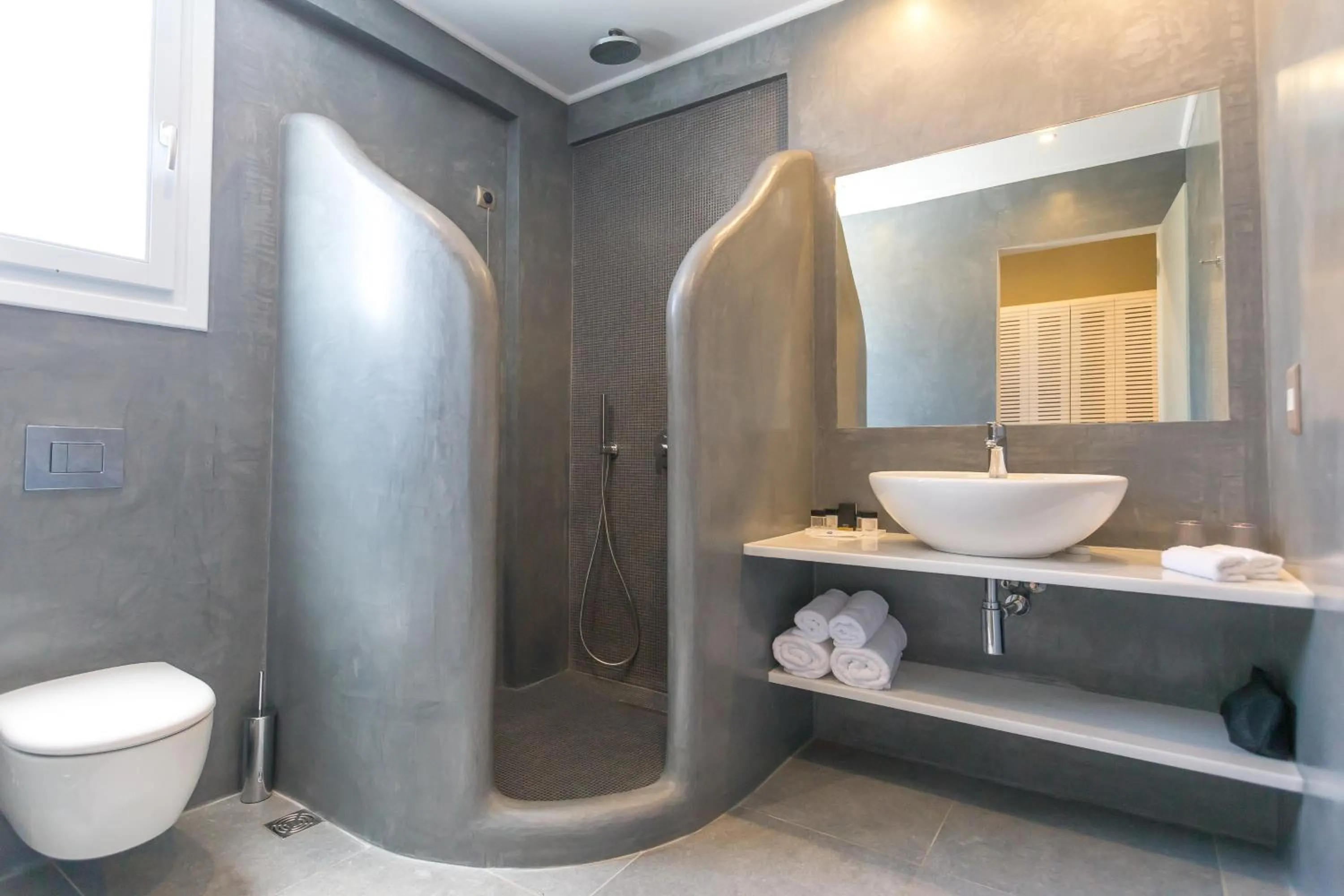 Shower in Acroterra Rosa Luxury Suites & Spa