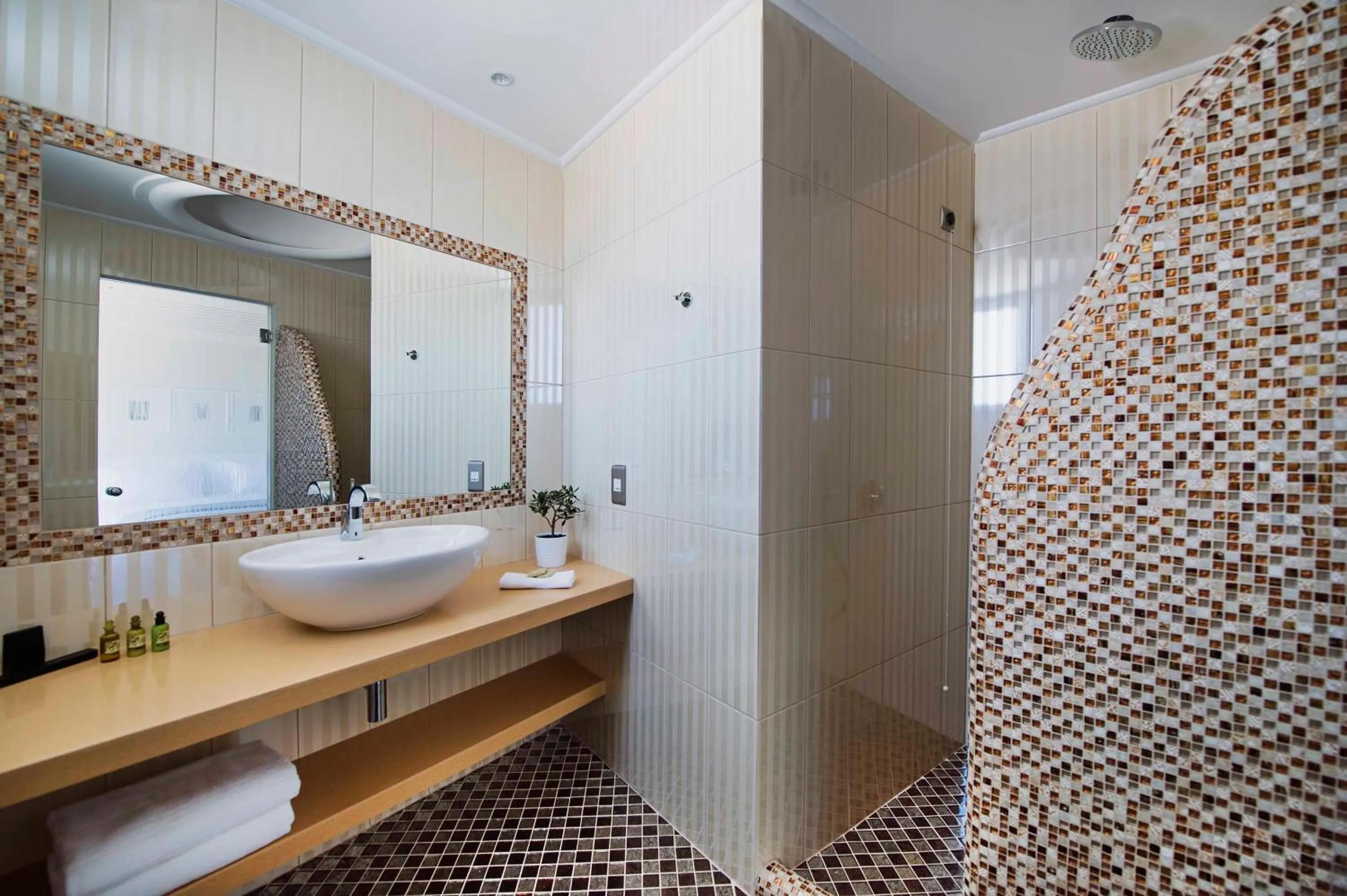 Bathroom in Acroterra Rosa Luxury Suites & Spa
