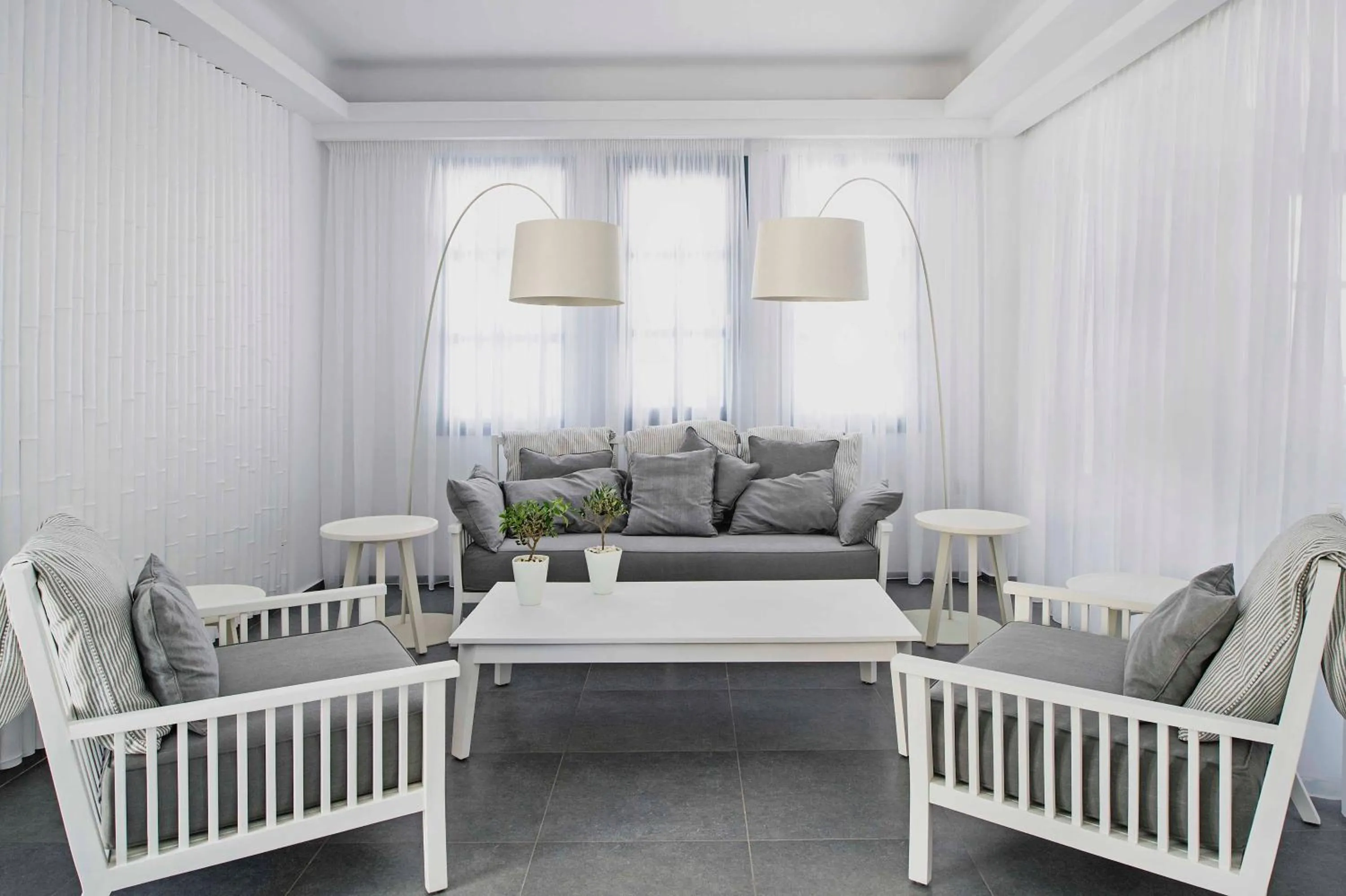 Communal lounge/ TV room in Acroterra Rosa Luxury Suites & Spa