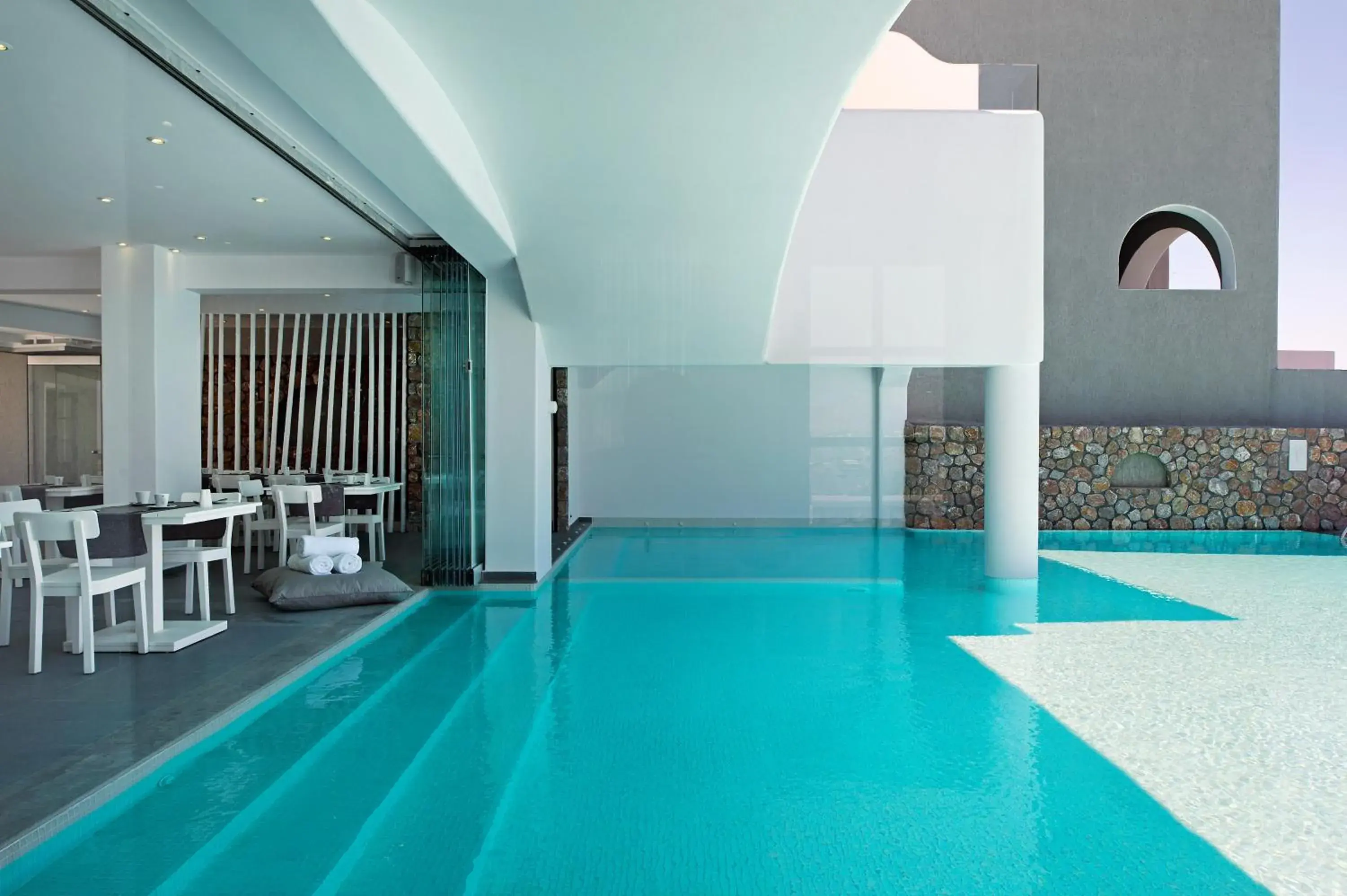Swimming pool in Acroterra Rosa Luxury Suites & Spa Swimming pool in Acroterra Rosa Luxury Suites & Spa