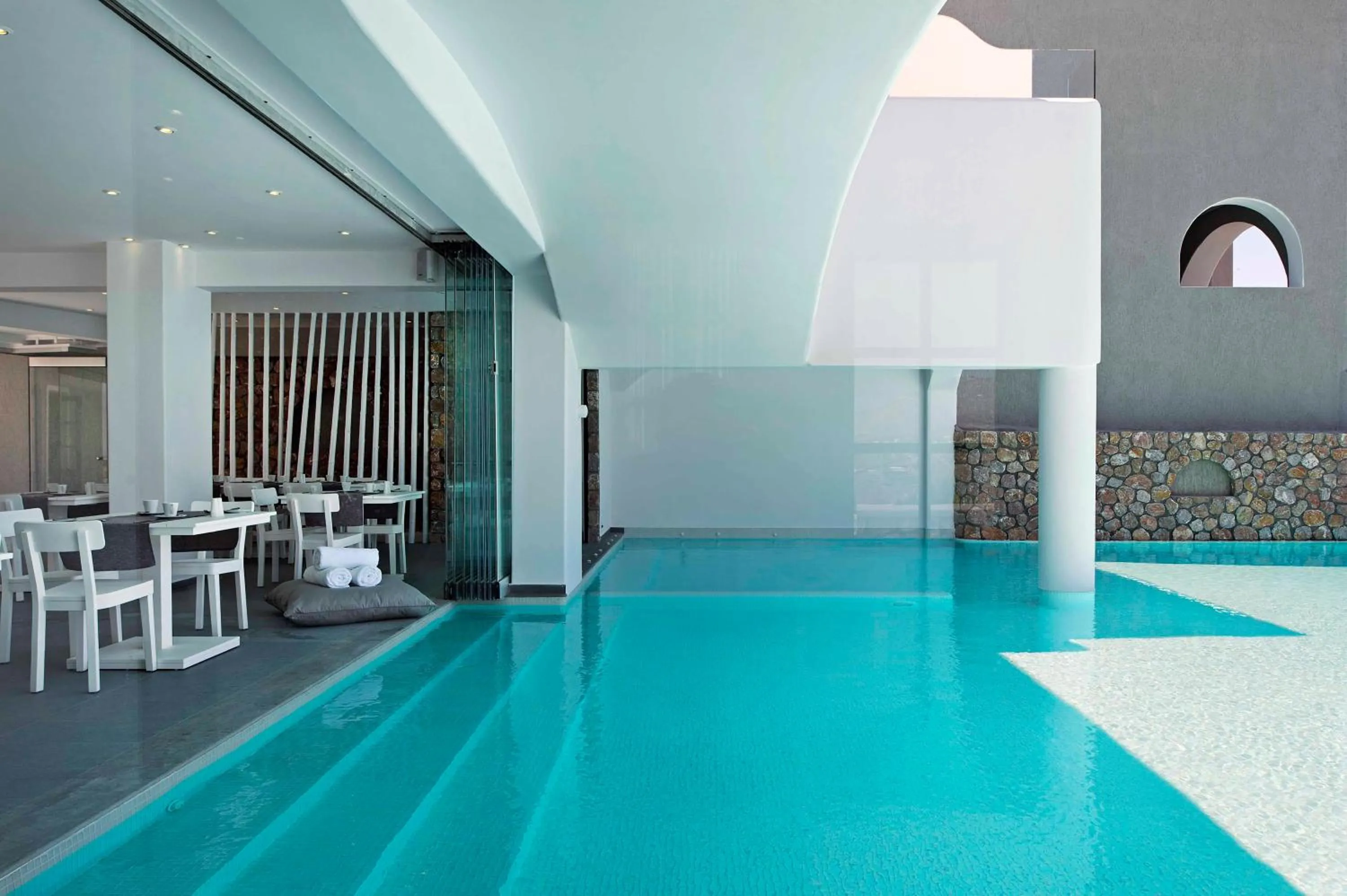 Swimming pool in Acroterra Rosa Luxury Suites & Spa