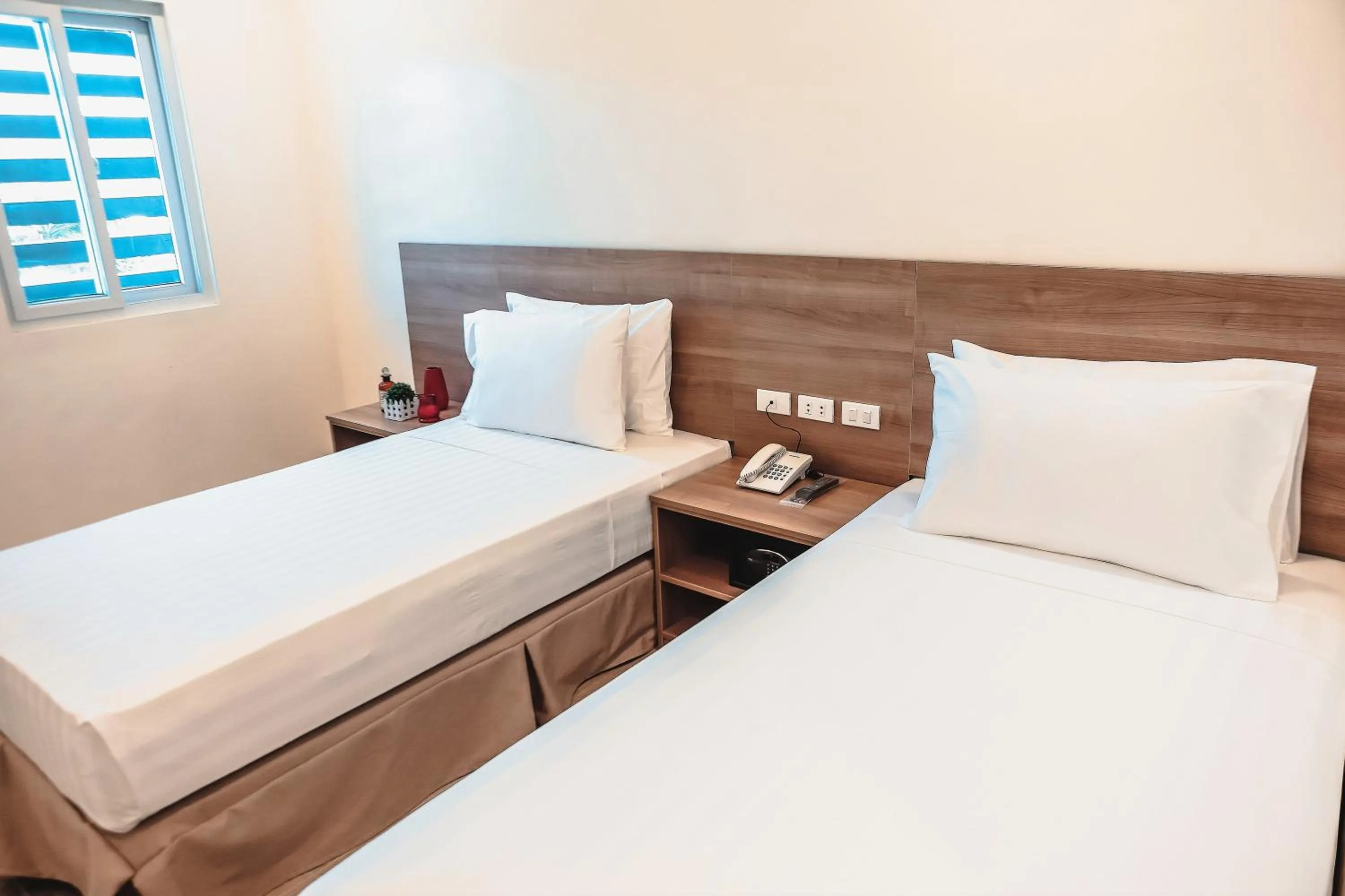 Bed in Trip Inn Legazpi City near Airport