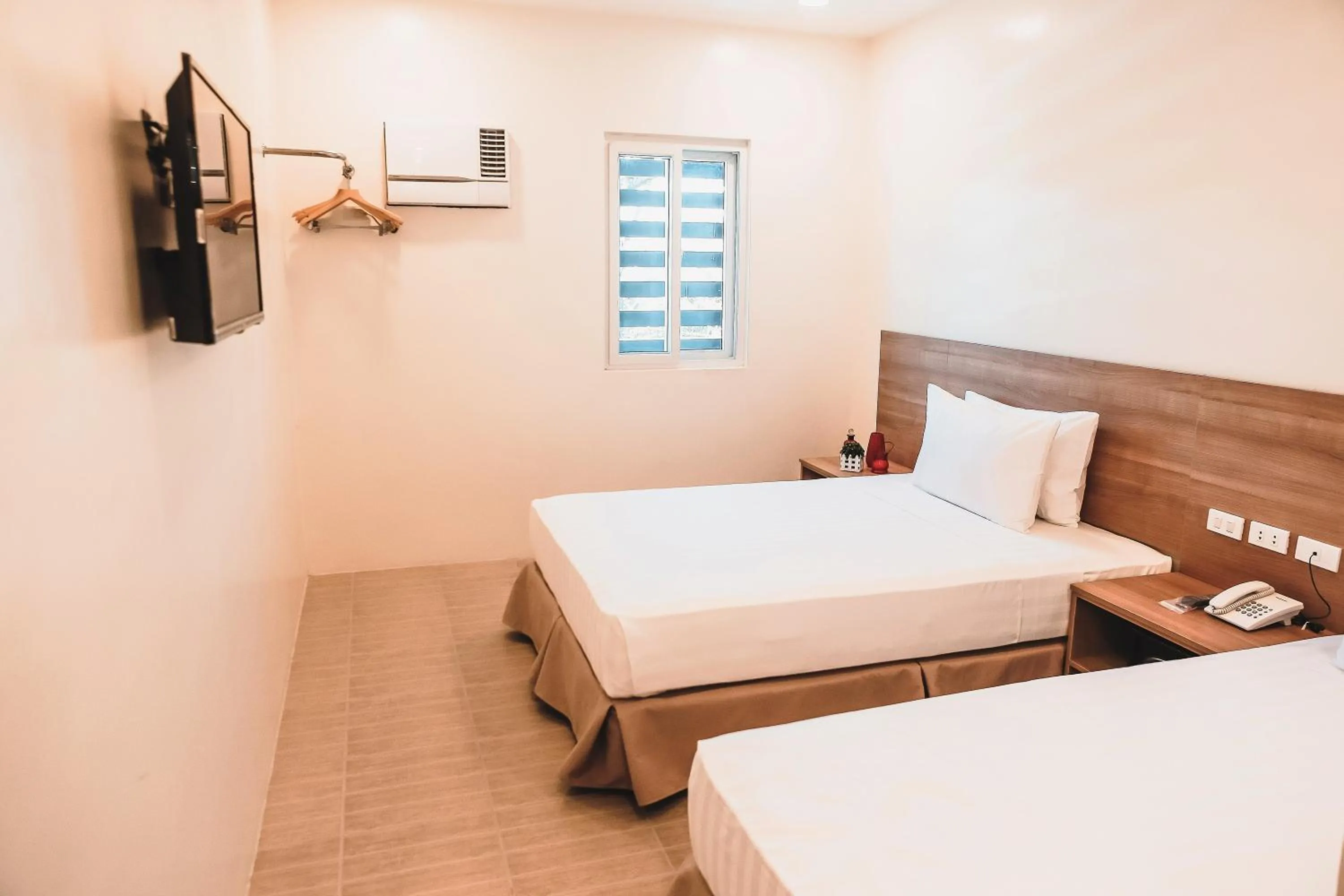 Bed in Trip Inn Legazpi City near Airport