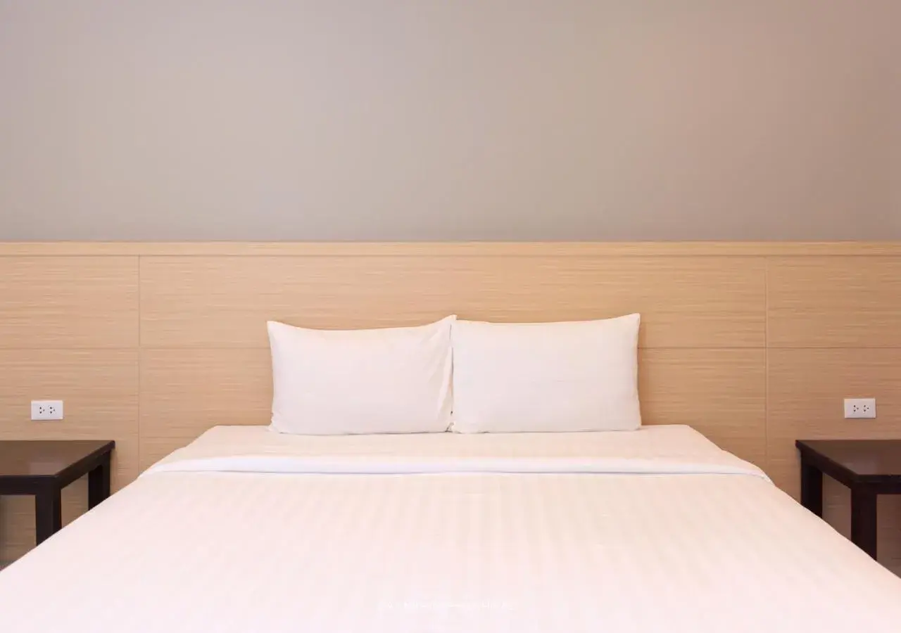 Bed in Baan Phor Phan Hotel Bed in Baan Phor Phan Hotel