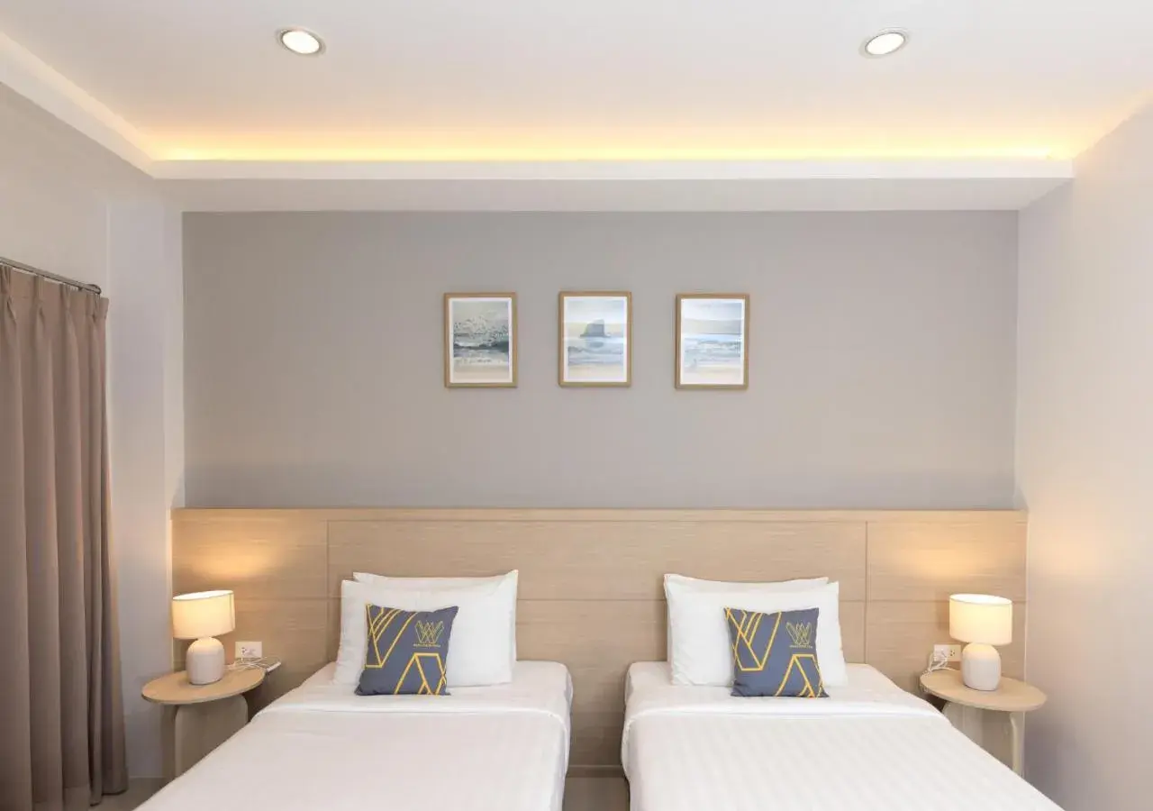 Bed in Baan Phor Phan Hotel Bed in Baan Phor Phan Hotel