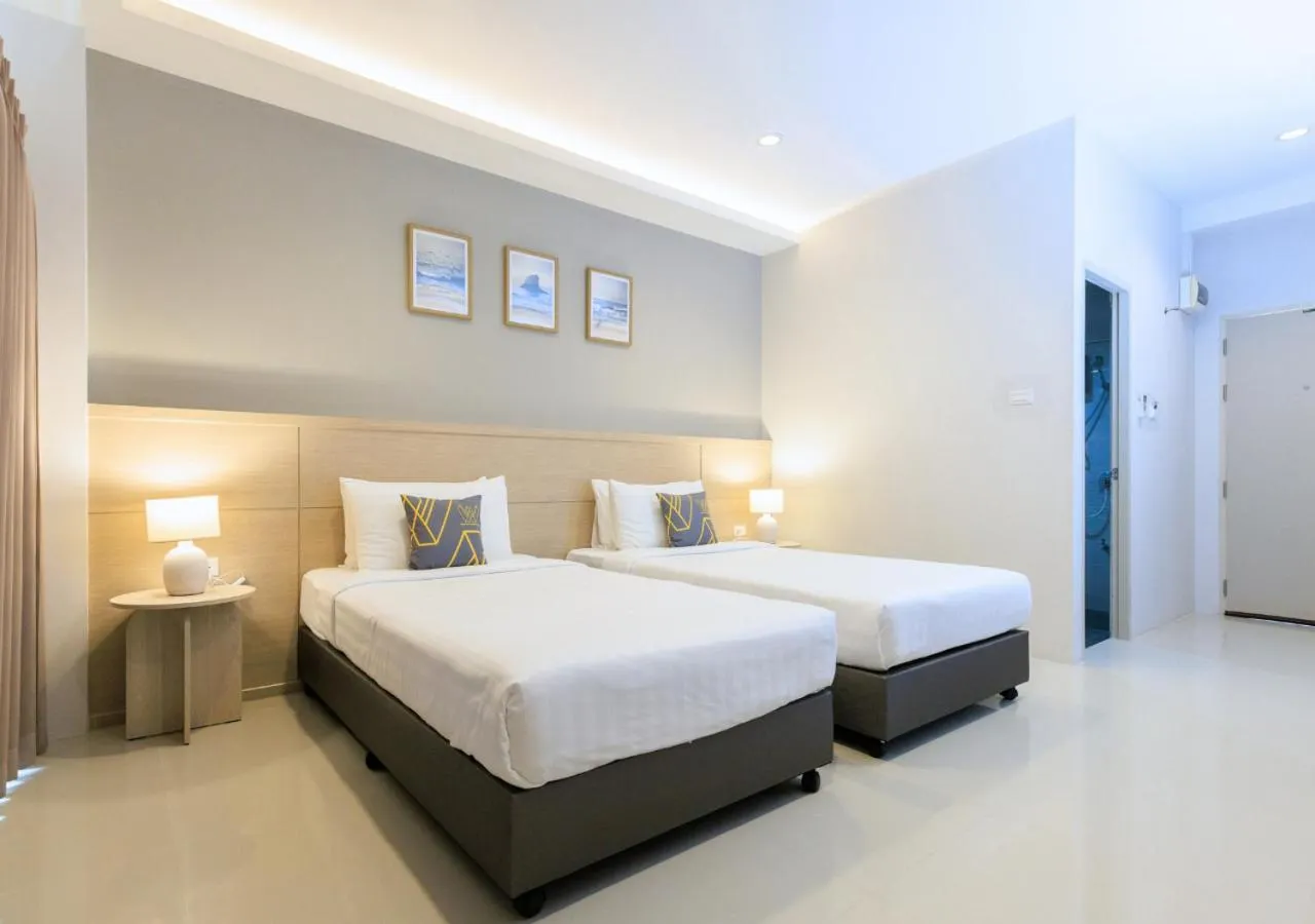 Bed in Baan Phor Phan Hotel