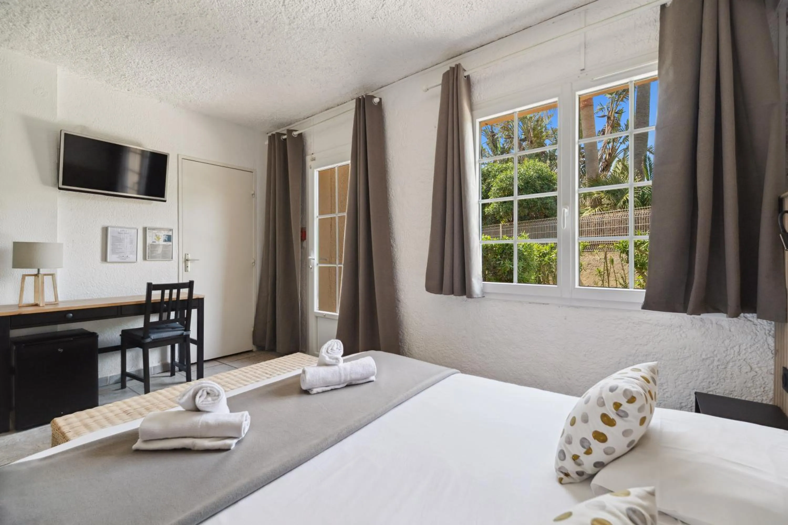 Bed in Hôtel La Nartelle