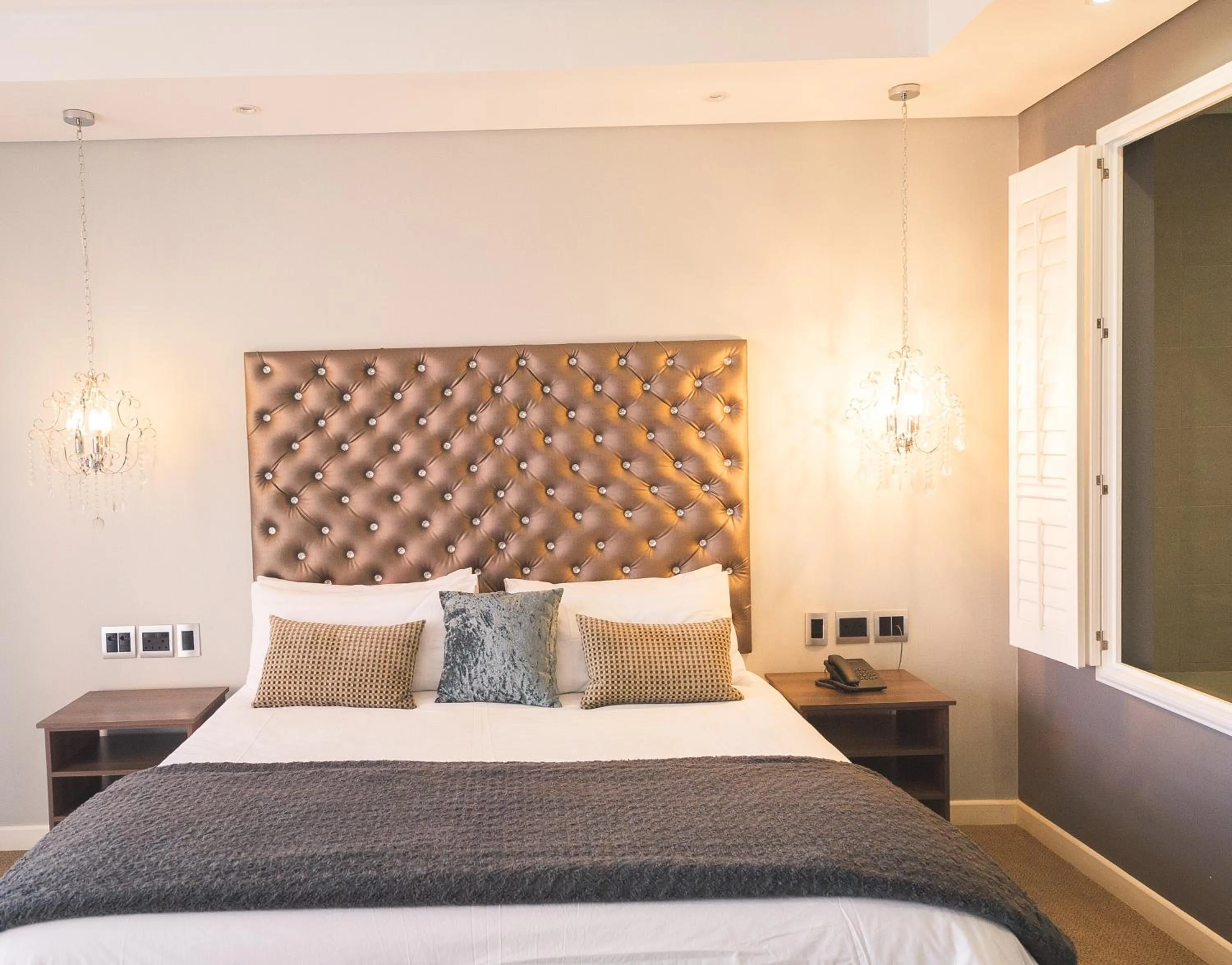 Bed in Blue Diamond Boutique Hotel