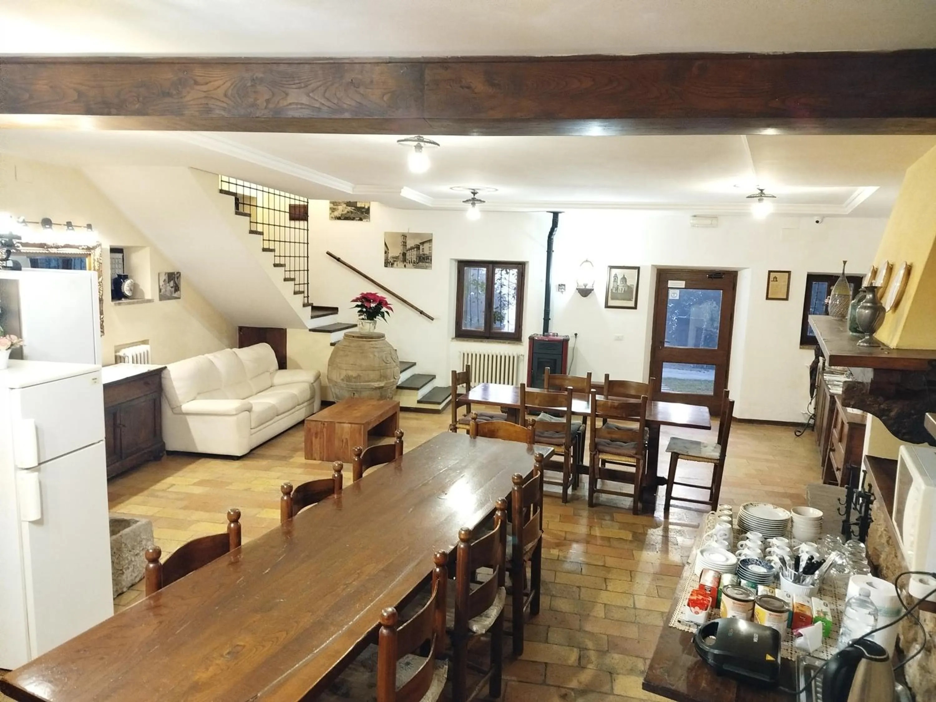 Communal lounge/ TV room in All'Ombra di San Damiano