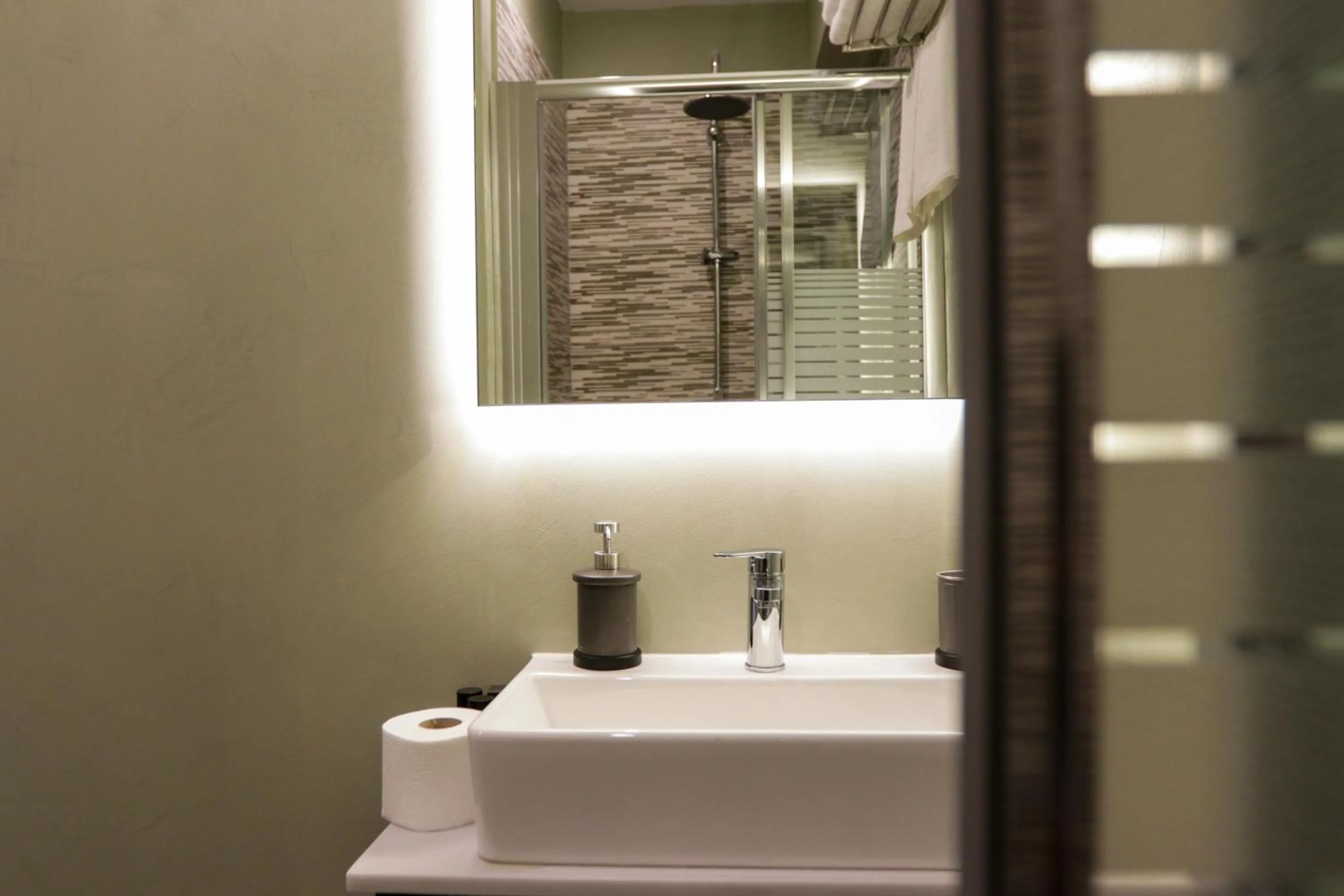 Bathroom in V36 Suites