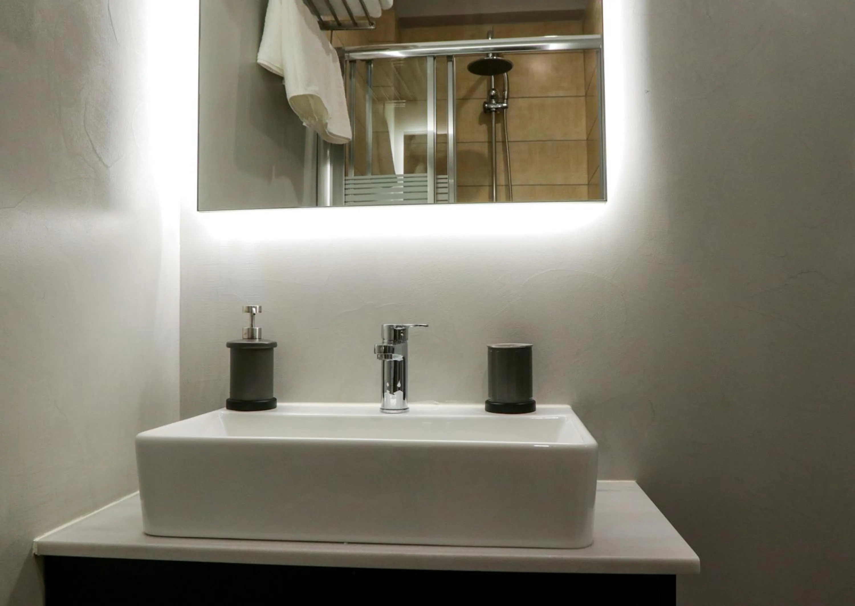 Bathroom in V36 Suites