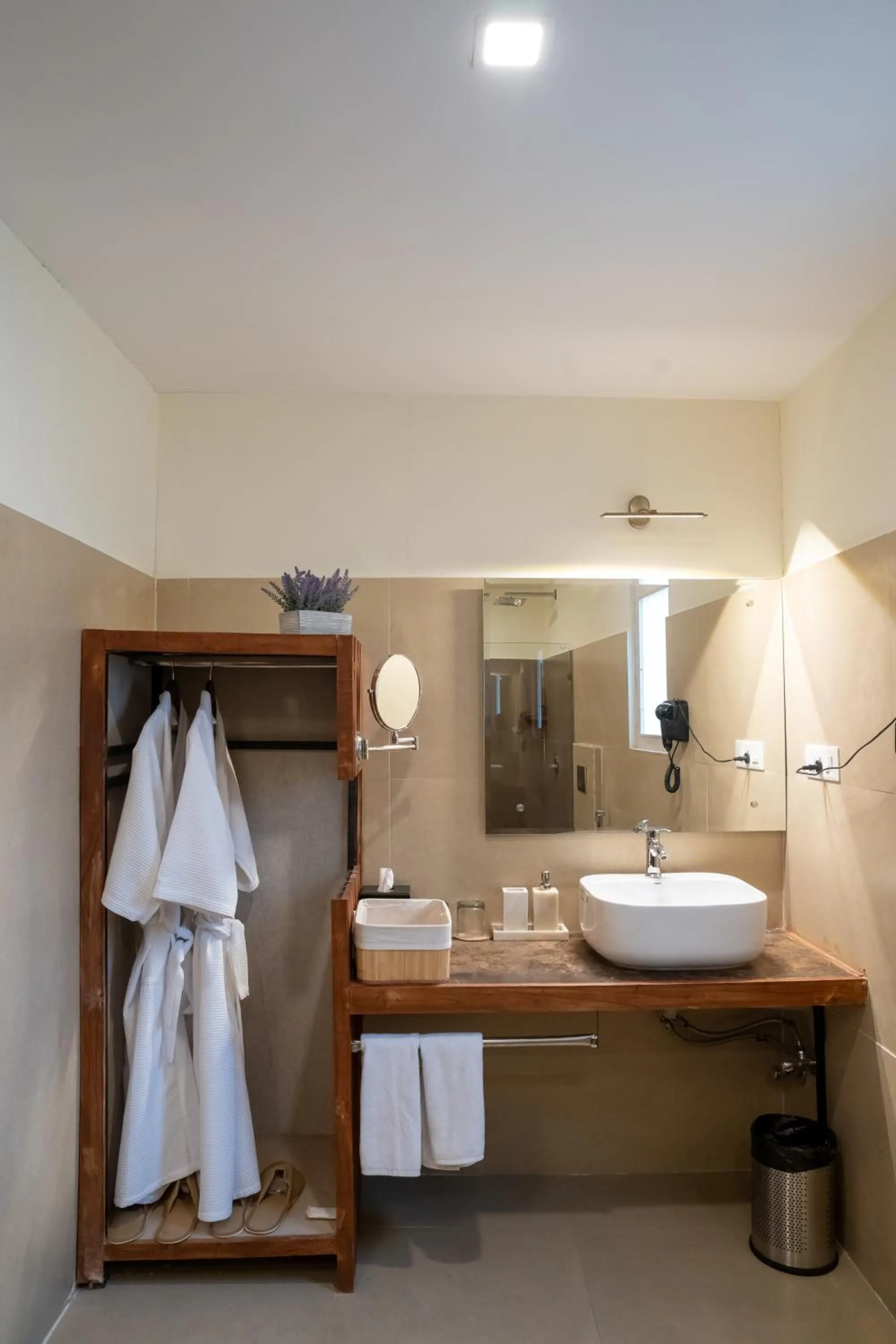 Bathroom in Dev Bhoomi Farms & Cottages