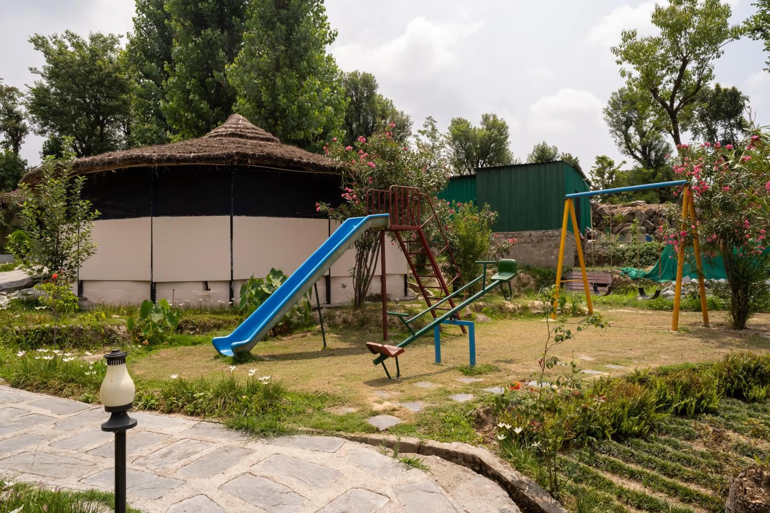 Children play ground in Dev Bhoomi Farms & Cottages
