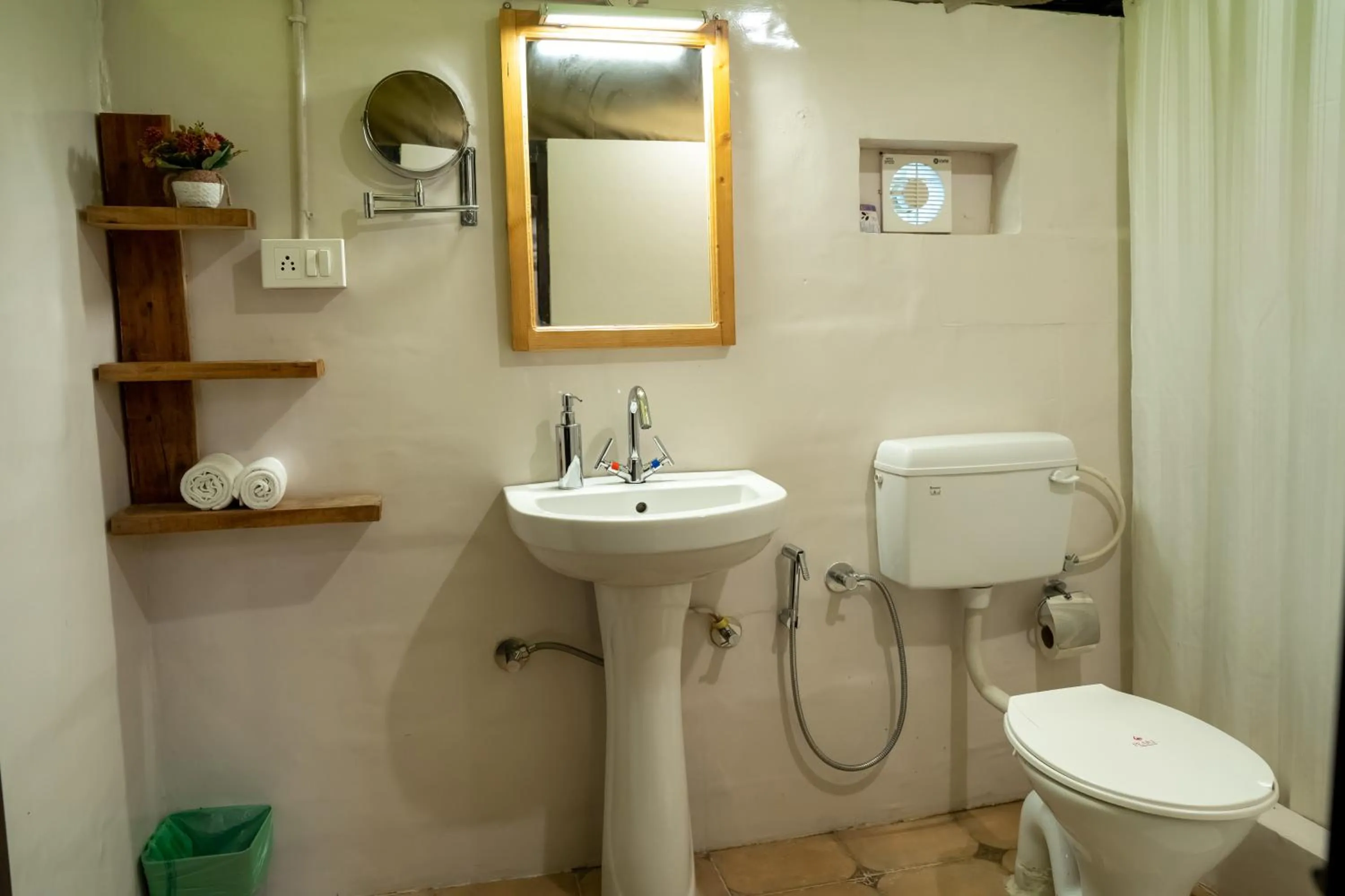 Bathroom in Dev Bhoomi Farms & Cottages