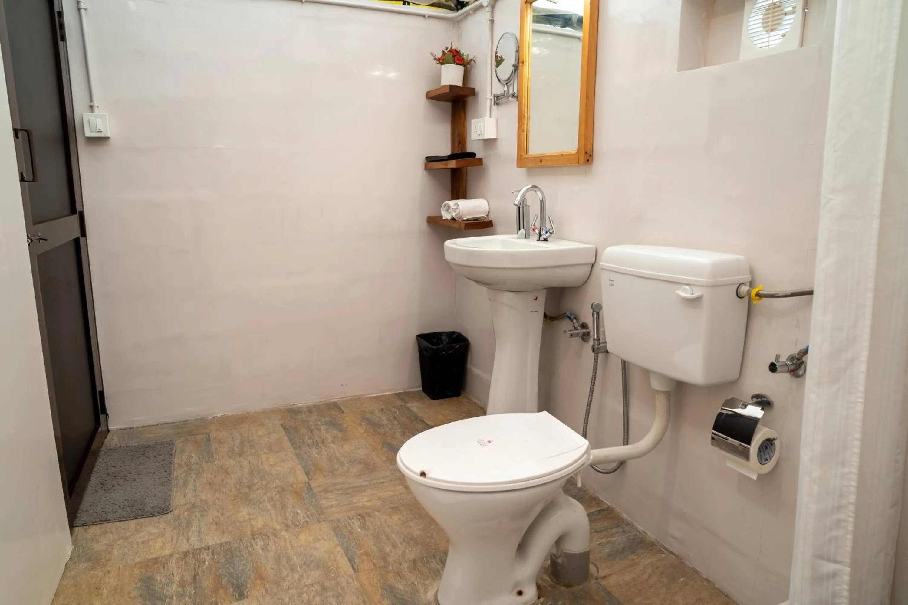 Toilet in Dev Bhoomi Farms & Cottages