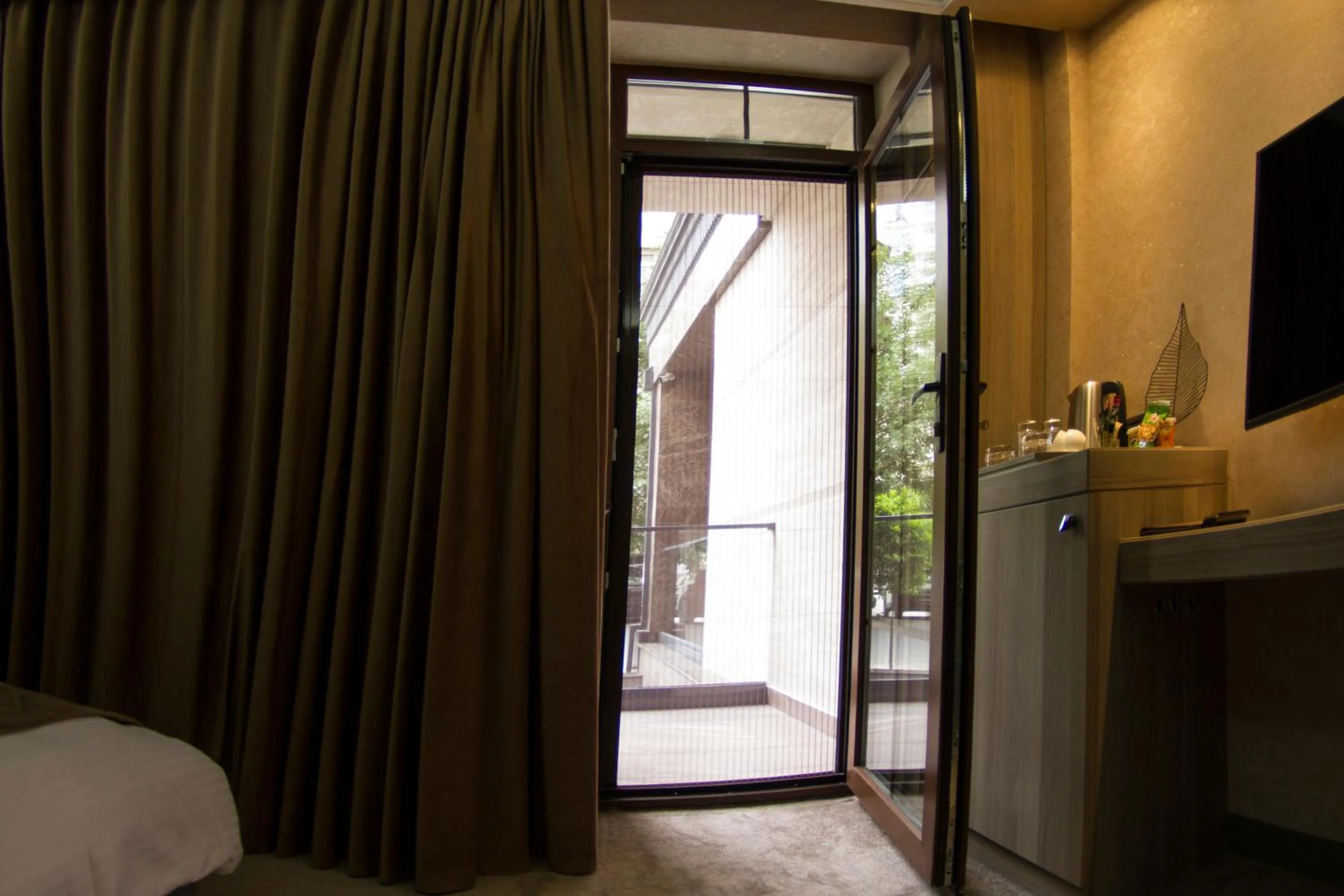 Bed in Home Boutique Hotel