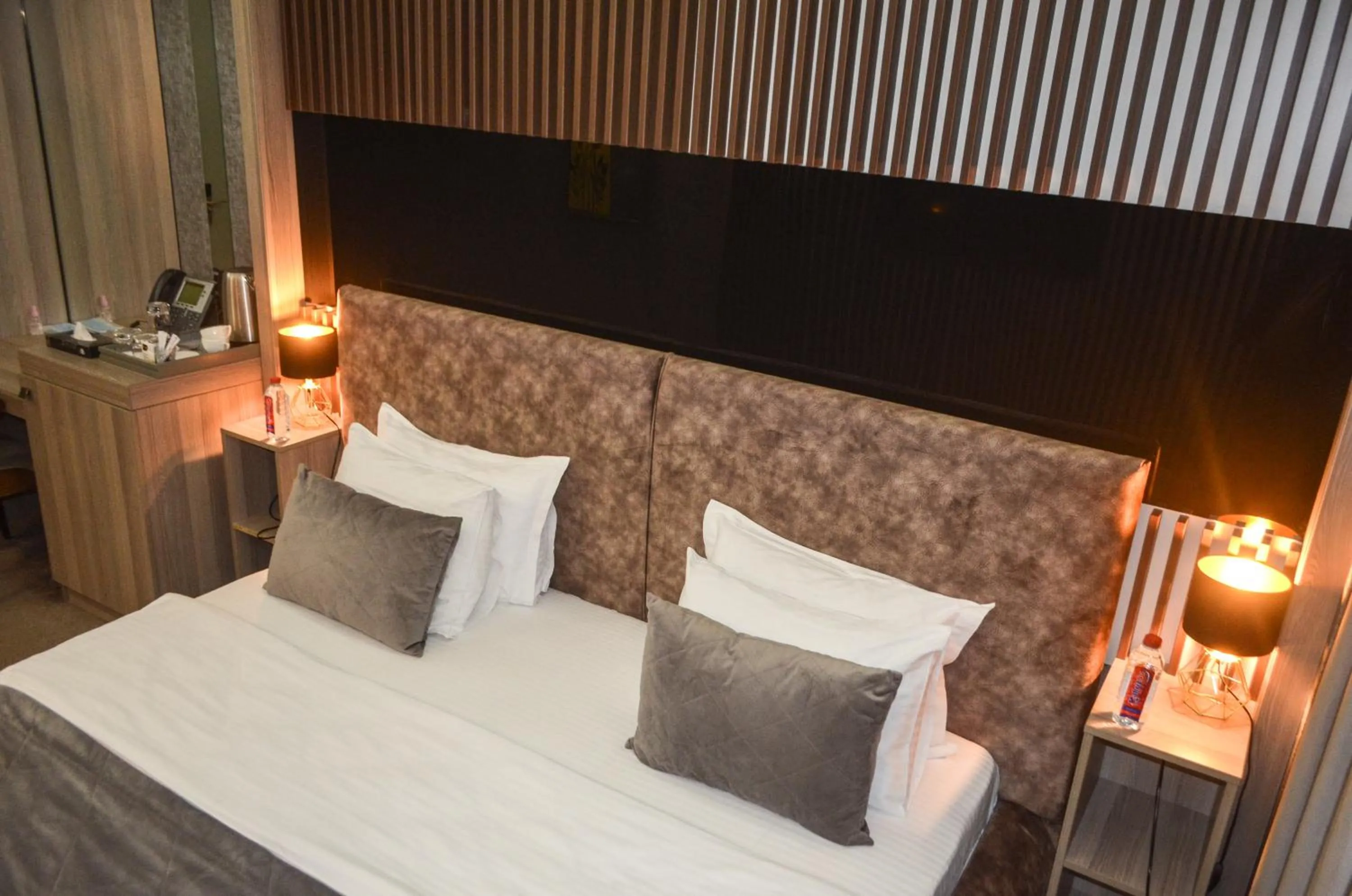 Bed in Home Boutique Hotel