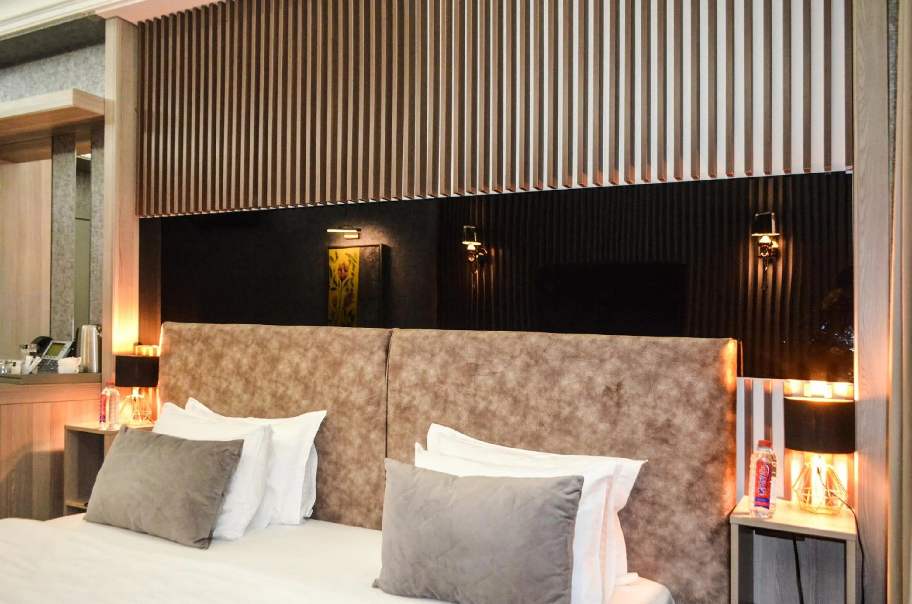 Bed in Home Boutique Hotel