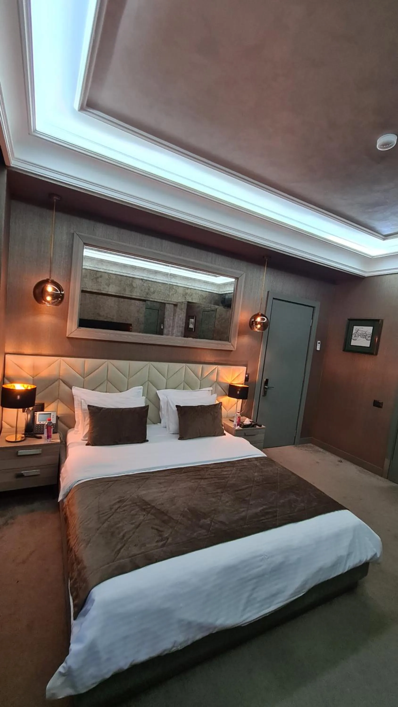 Bed in Home Boutique Hotel