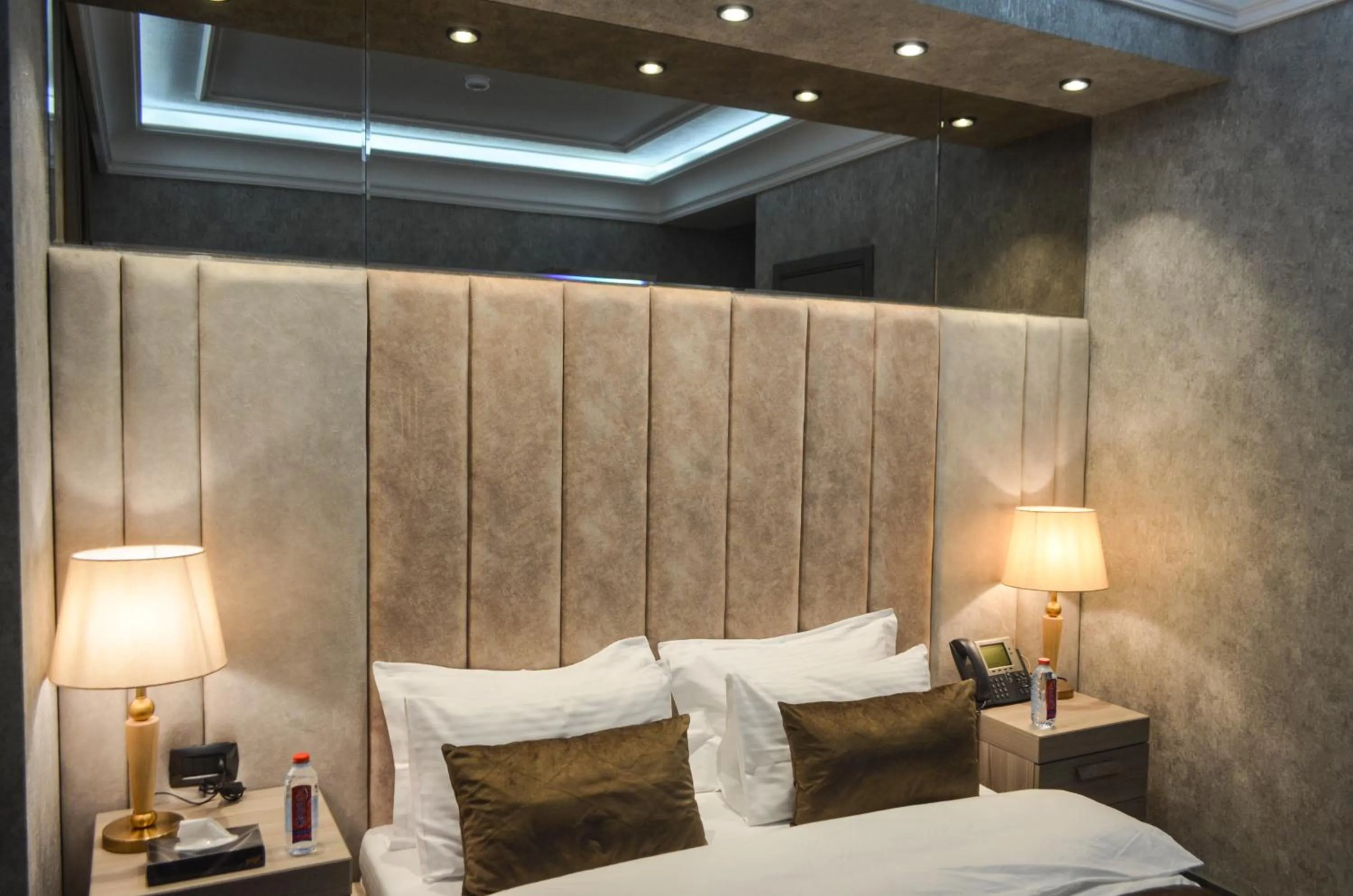 Bed in Home Boutique Hotel