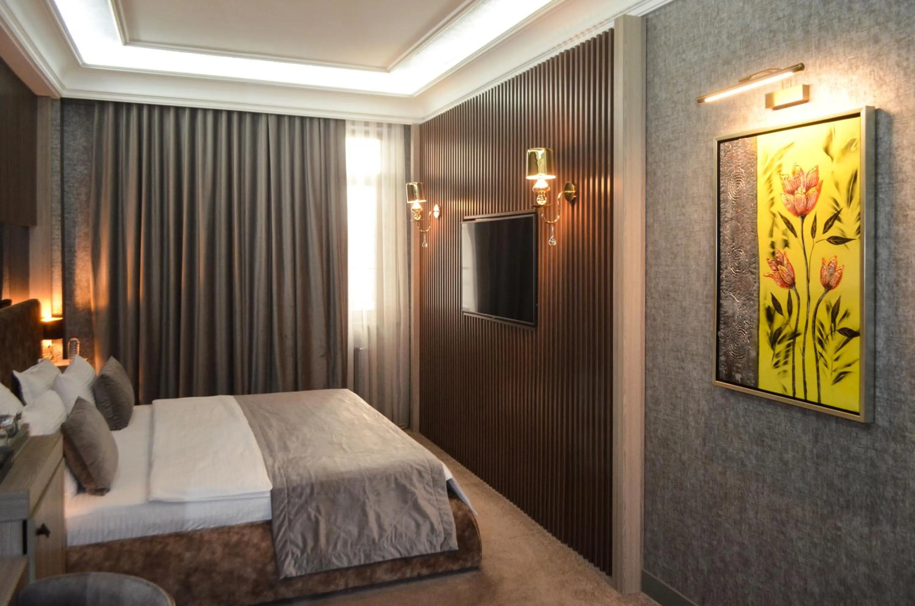 Bed in Home Boutique Hotel