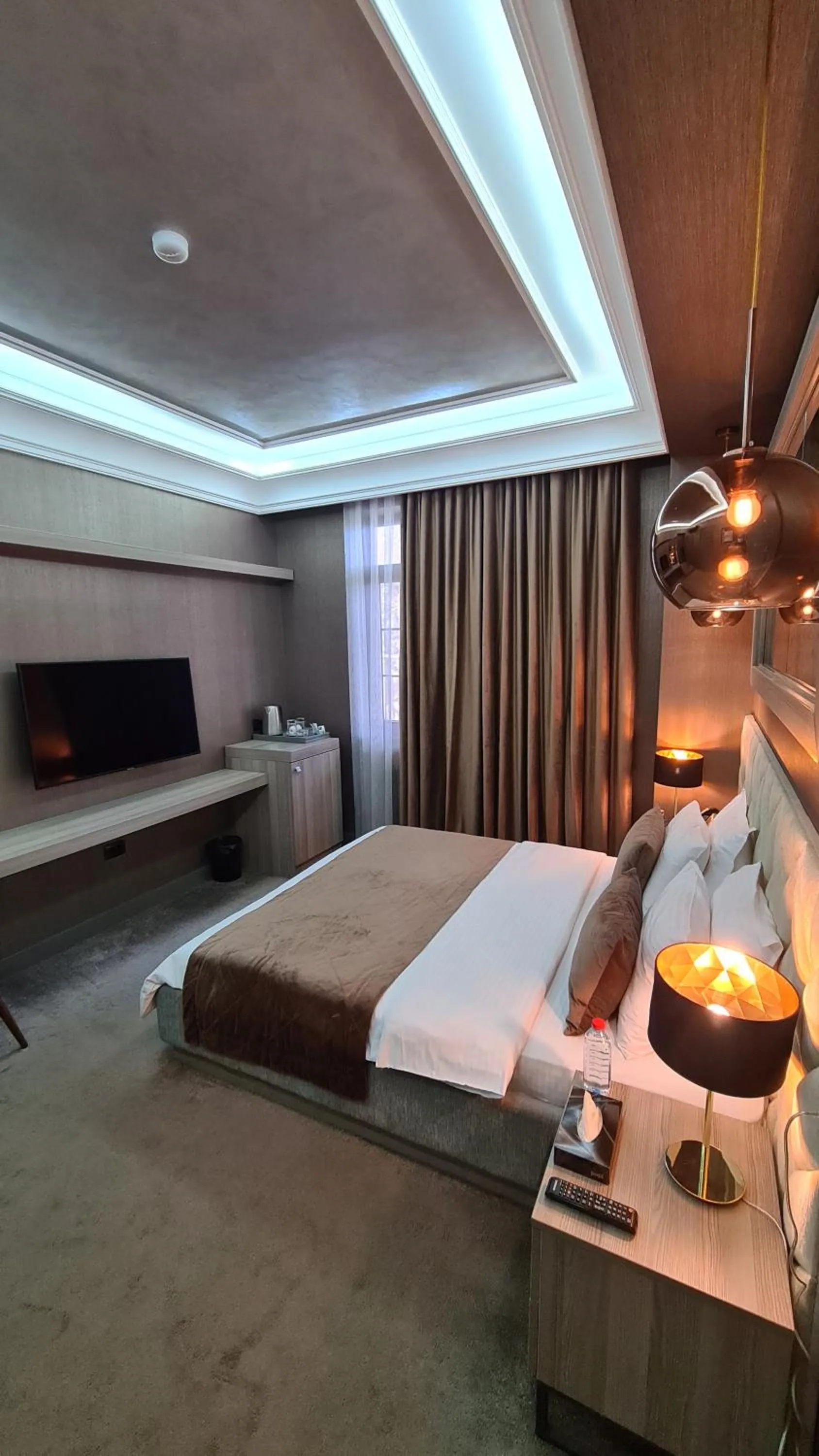 Bed in Home Boutique Hotel