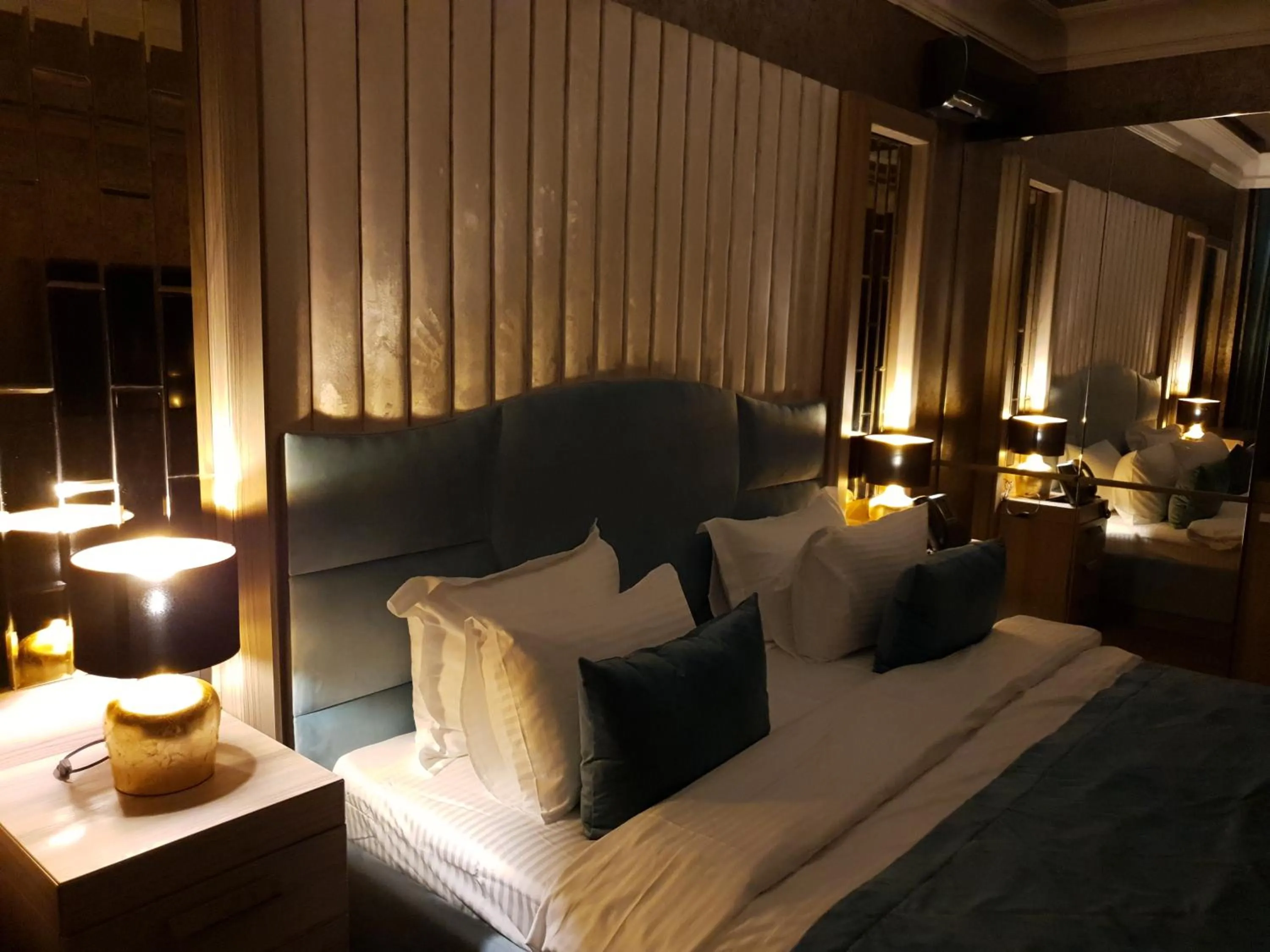 Bed in Home Boutique Hotel